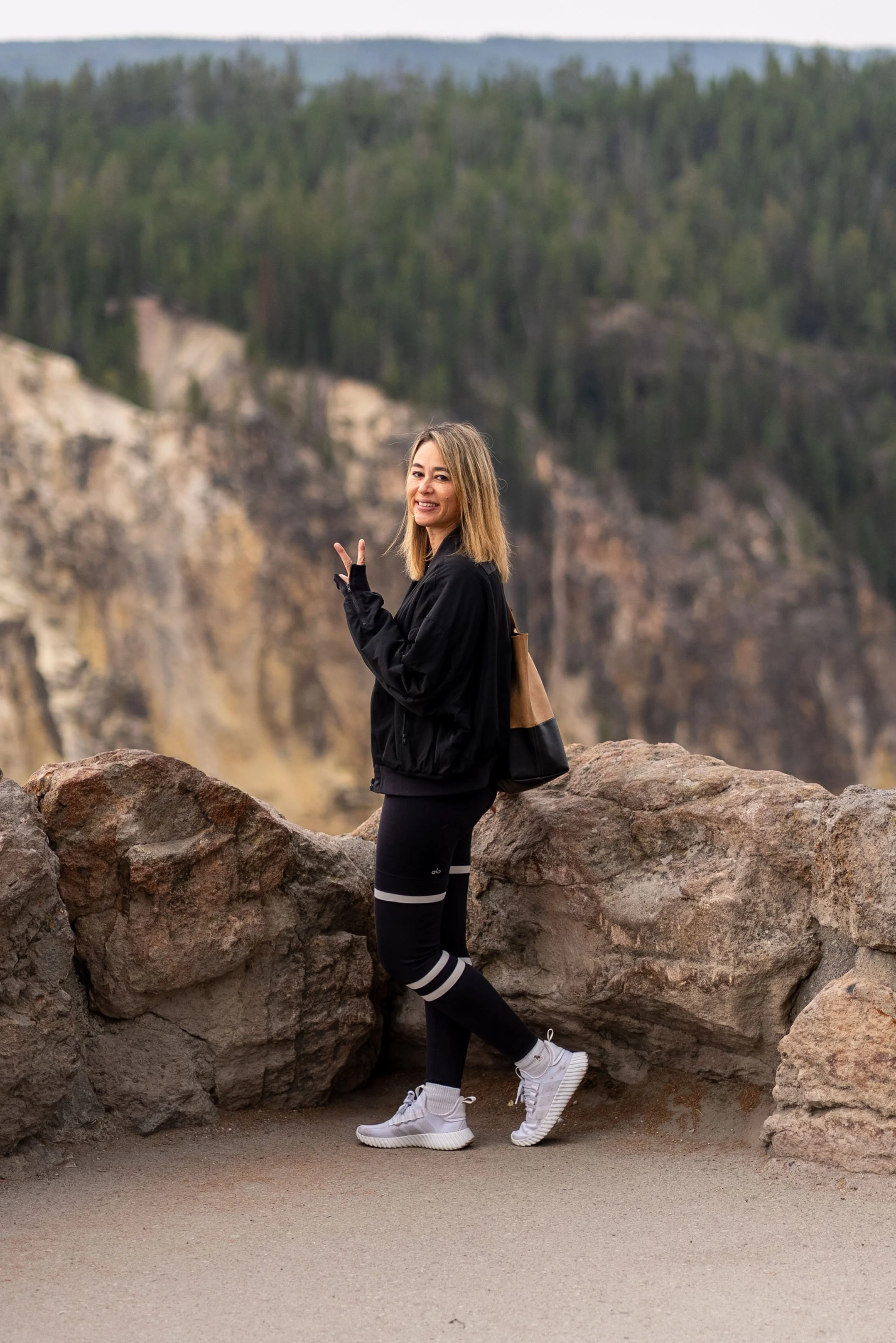 Posing in front of the Grand Canyon of Yellowstone
