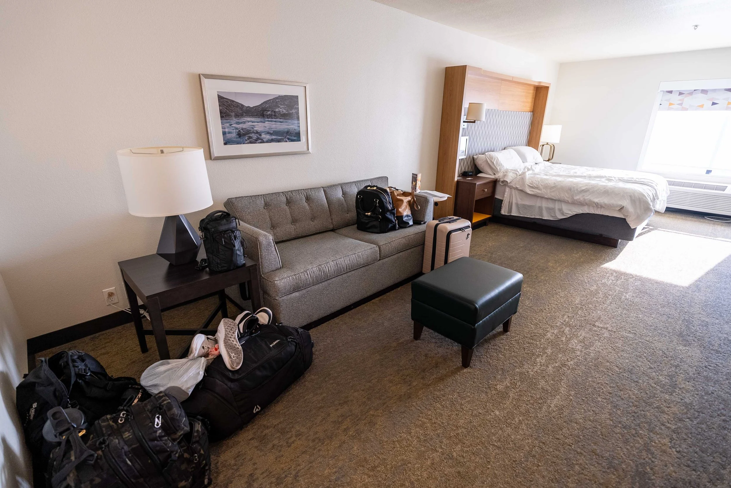 Spacious hotel room with sofa bed