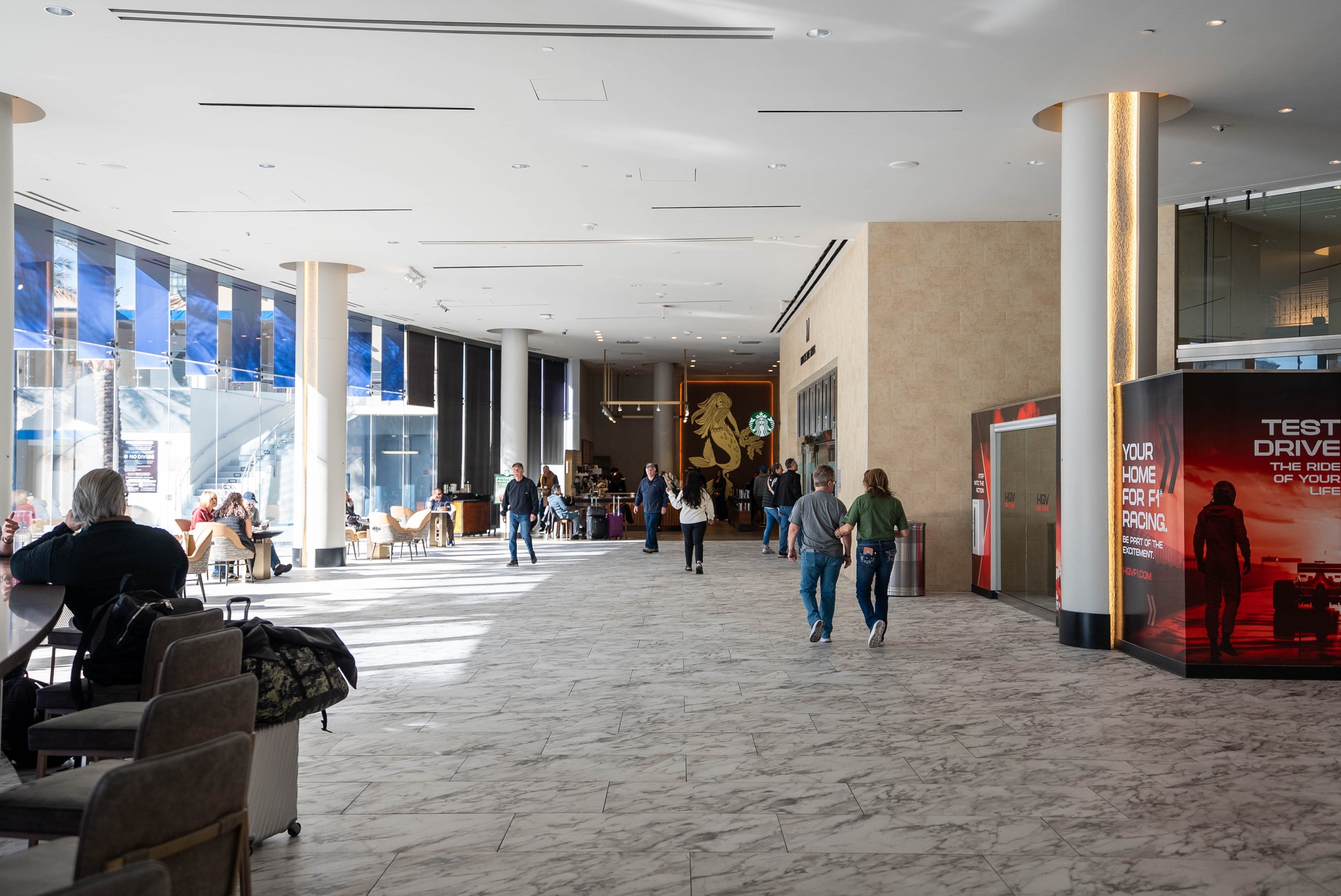Hilton Elara lobby area with a bar and Starbucks