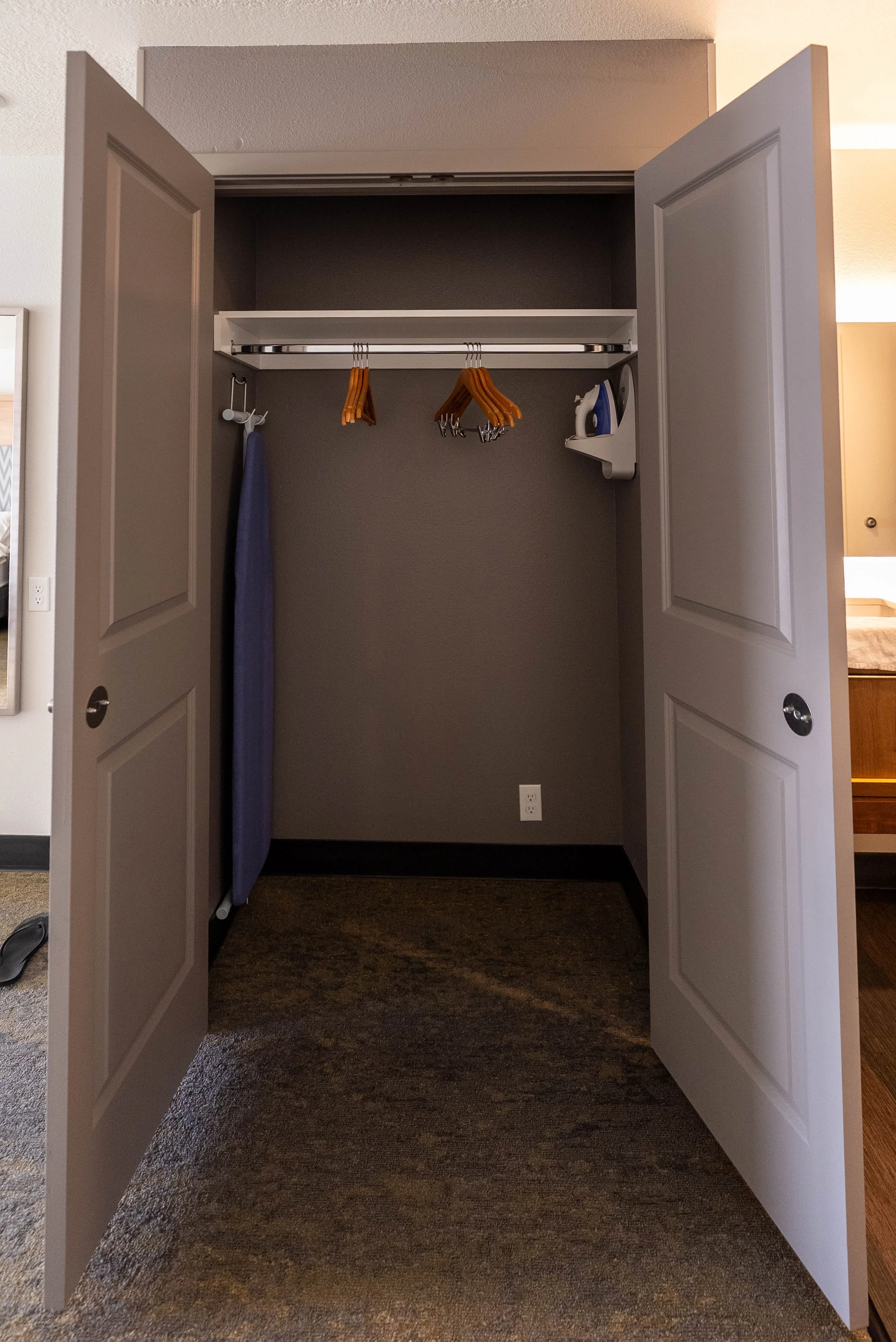 Huge closet with iron and ironing board