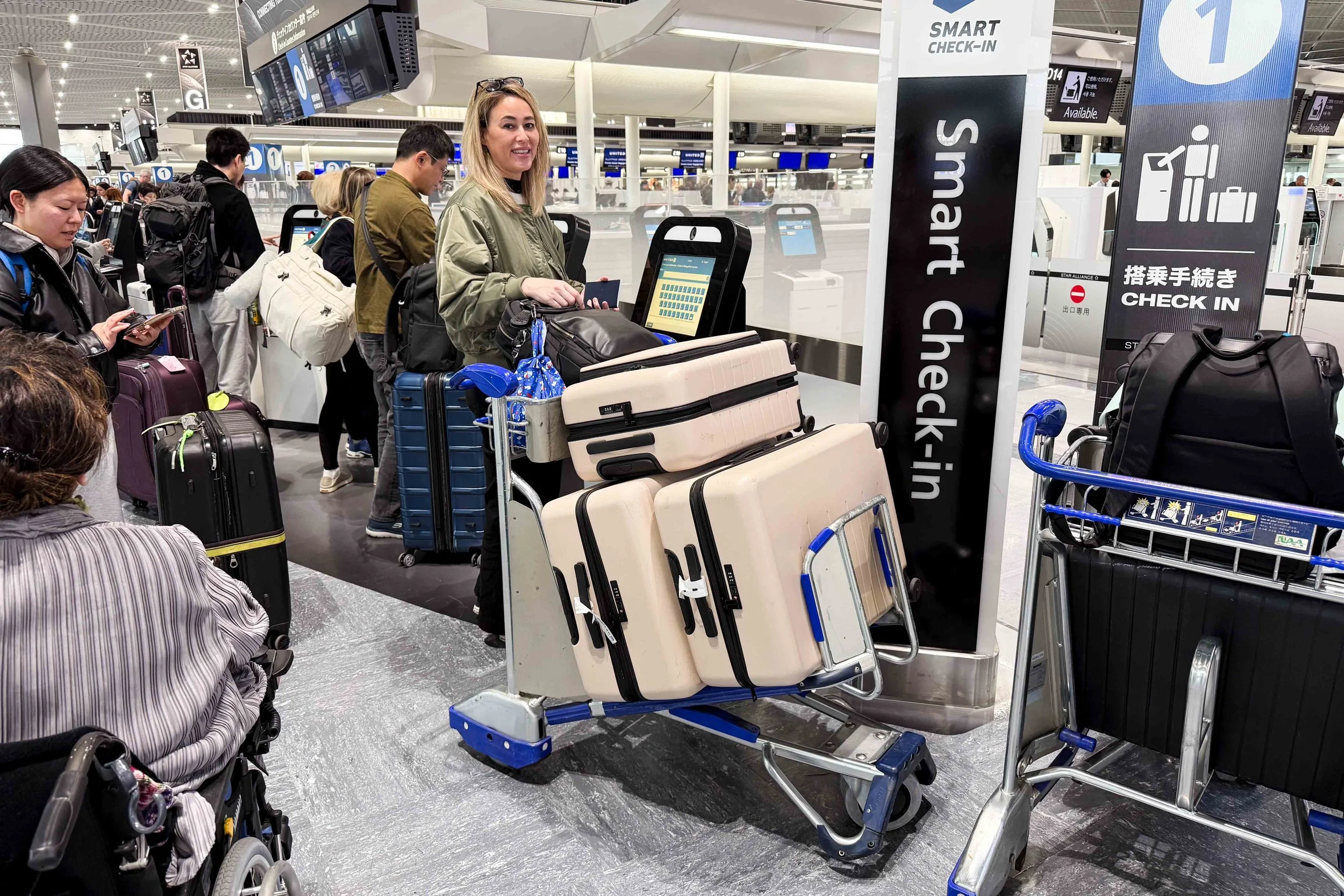 Checking in at United’s kiosk at Narita airport