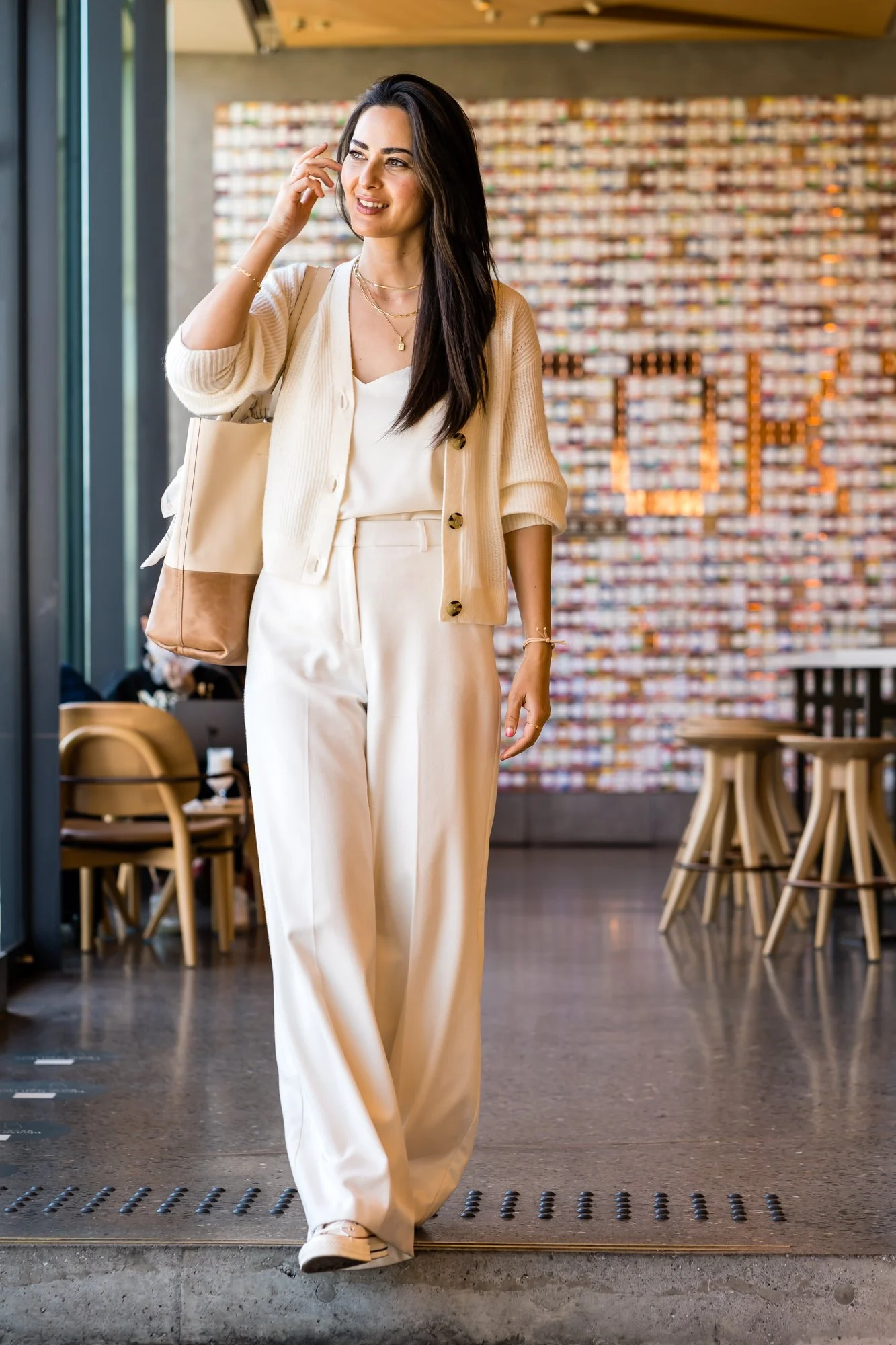 wearing an all white outfit