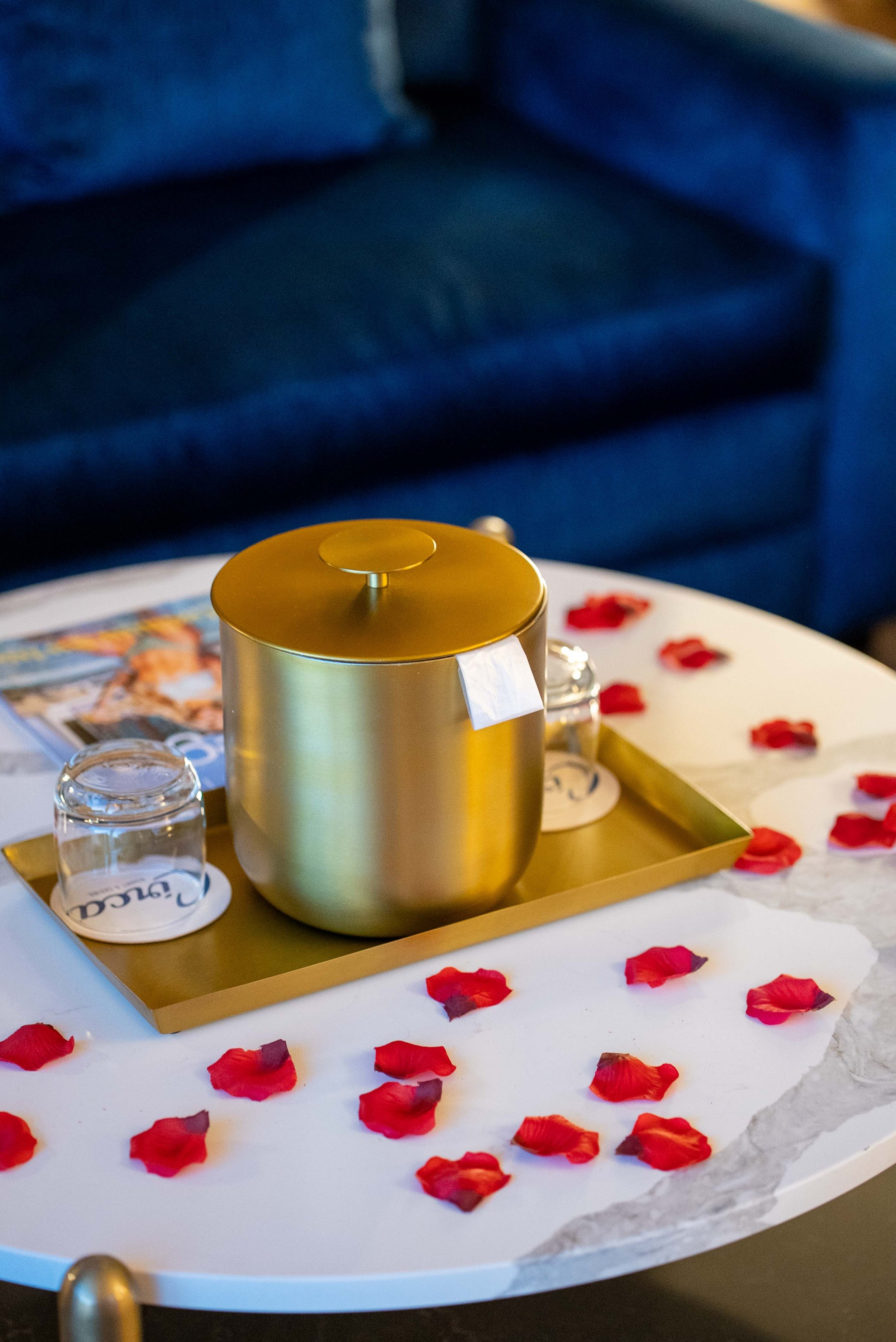 Coffee table with rose petals