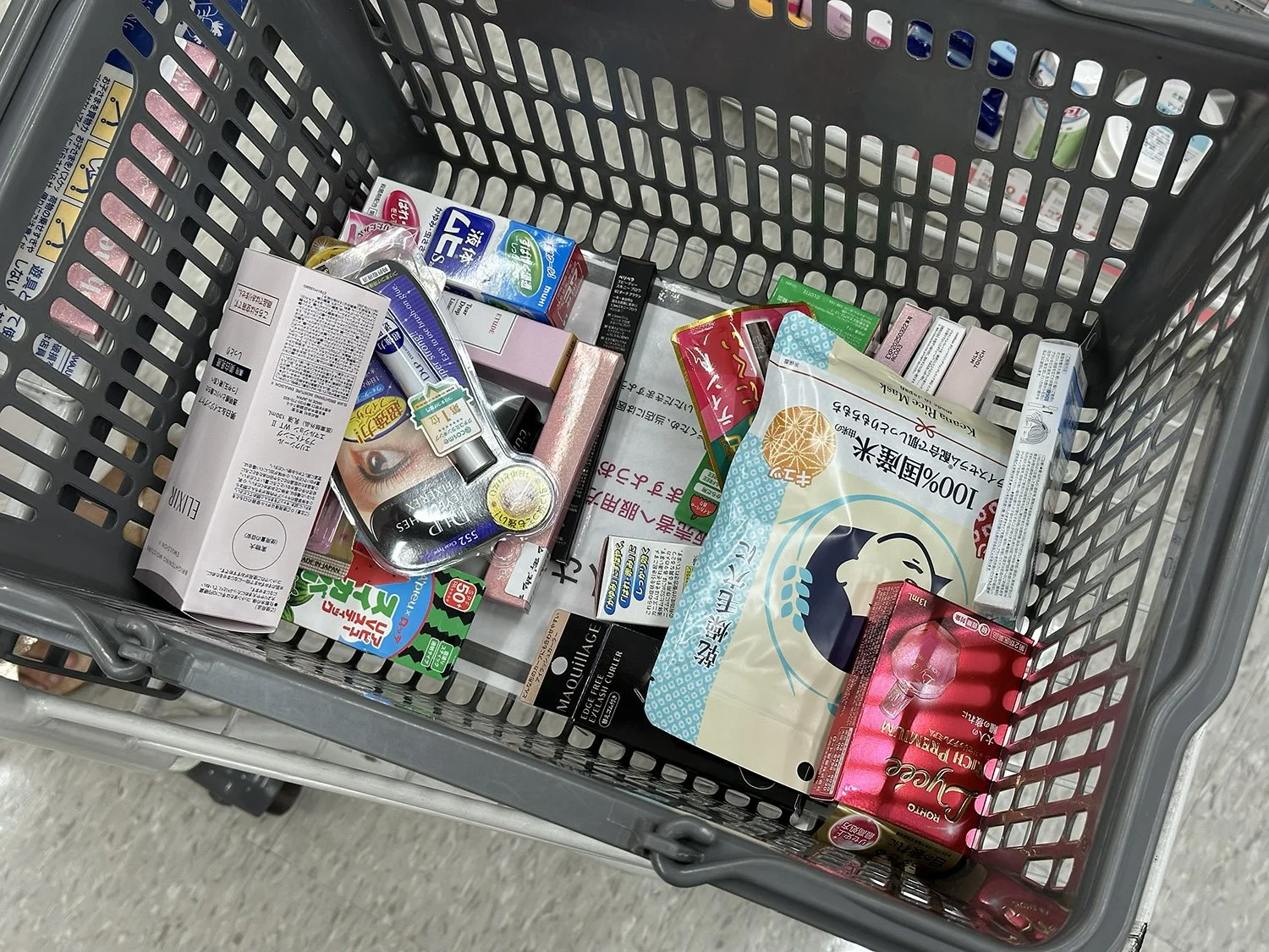 Shopping cart filled with cosmetics
