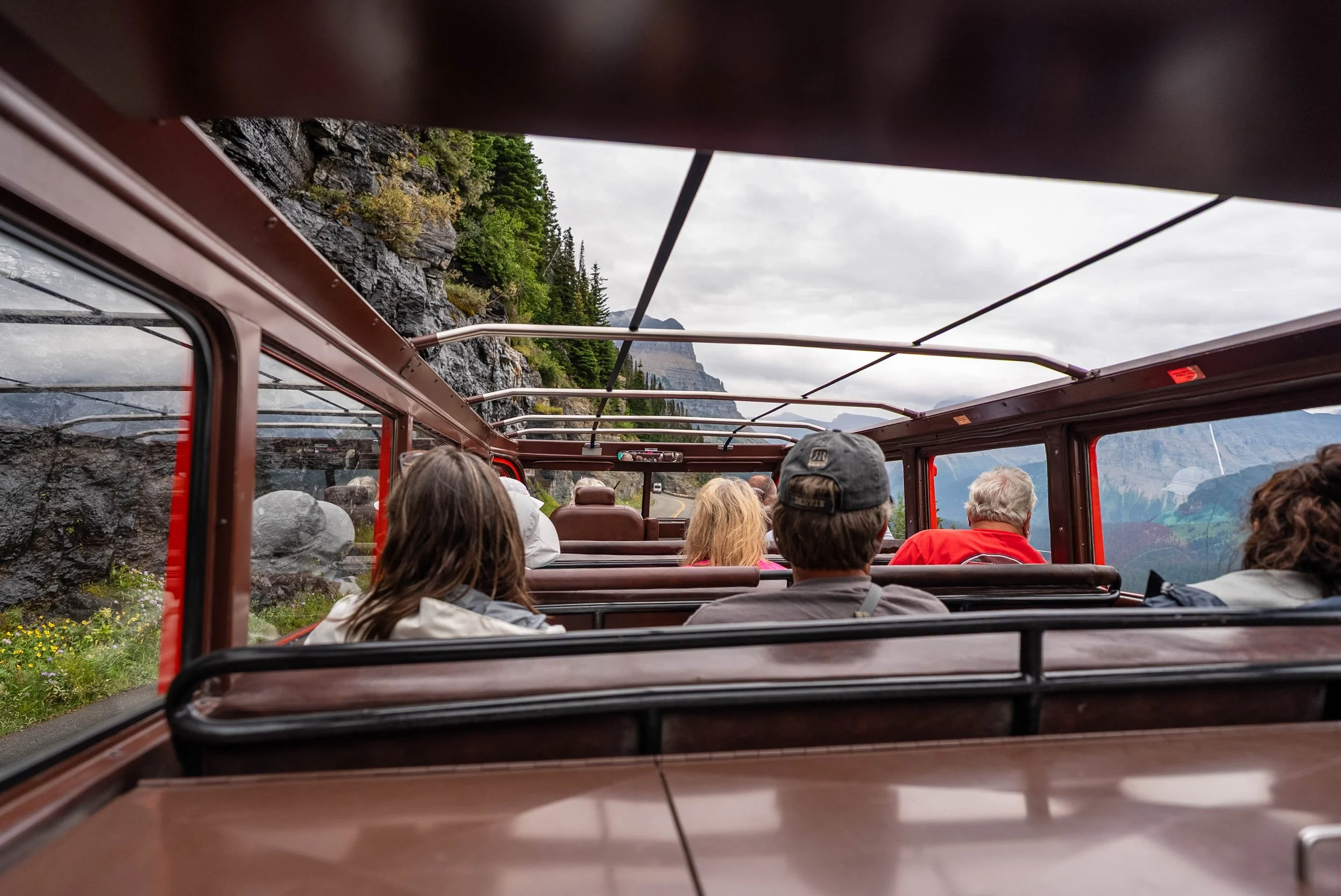 Red bus tour with top off