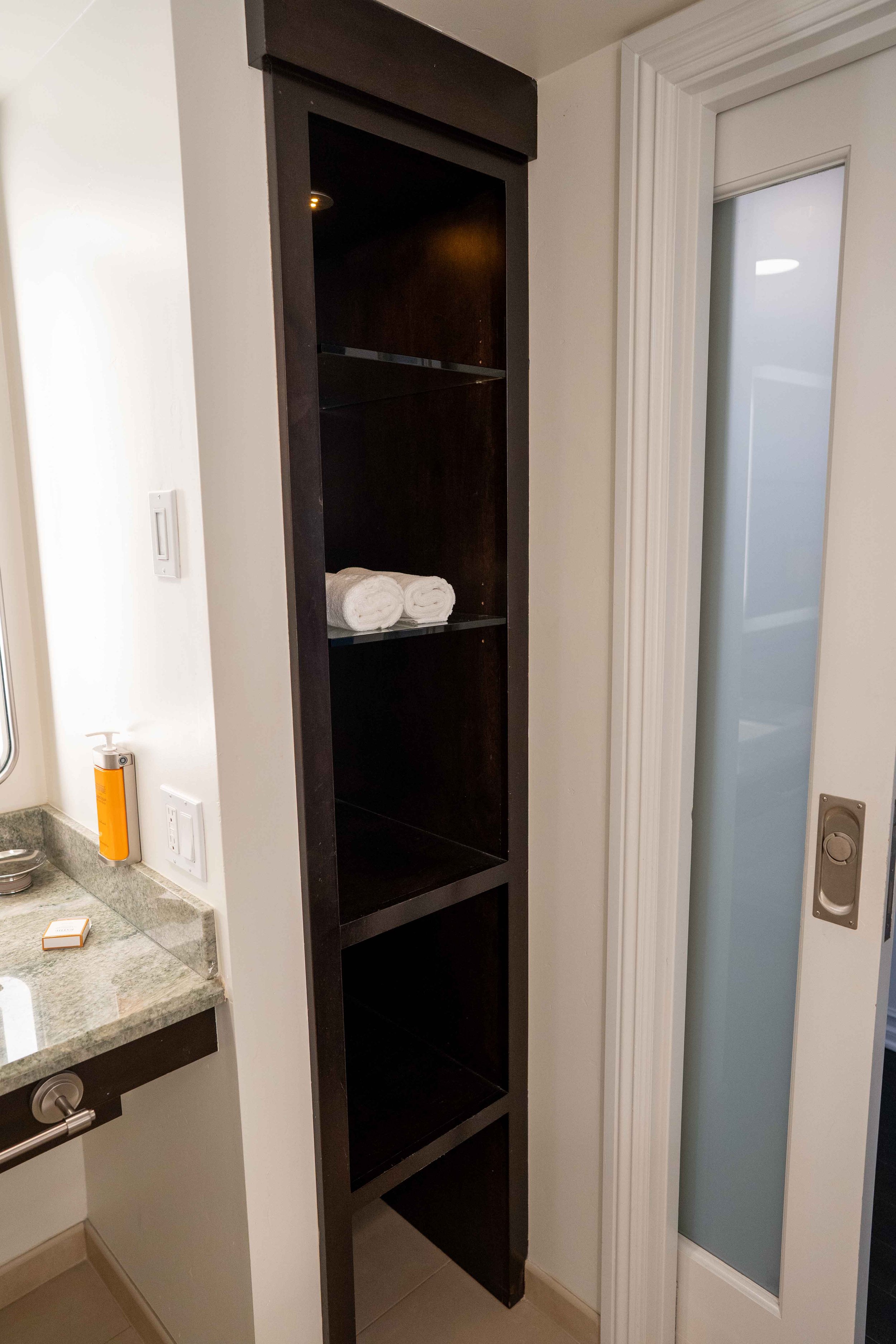 bathroom open shelf storage