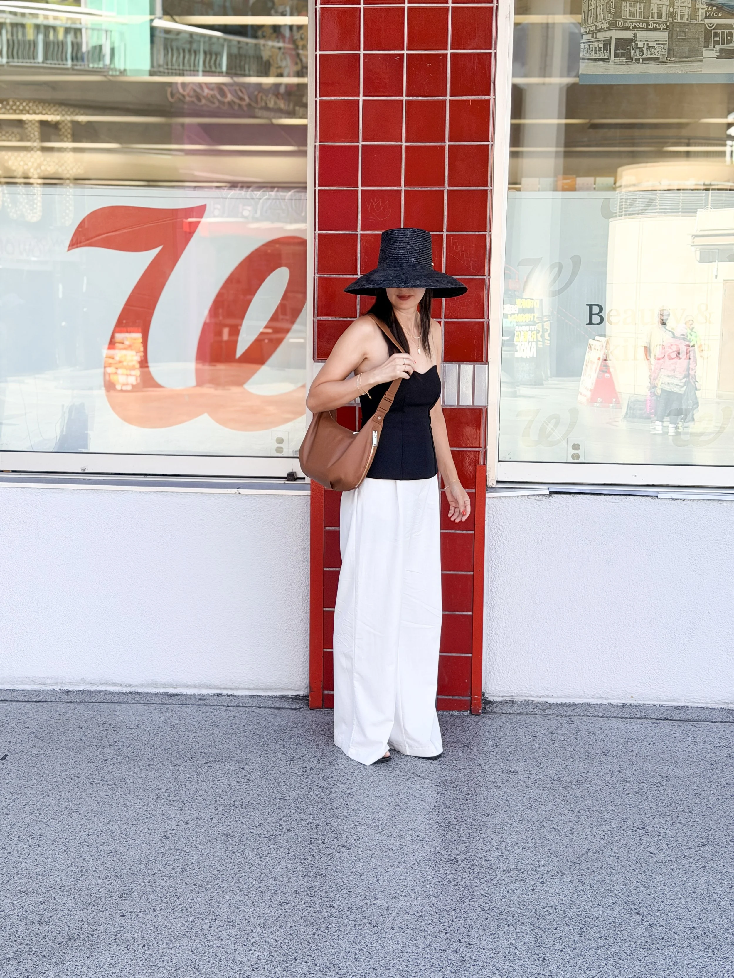 carrying a brown purse