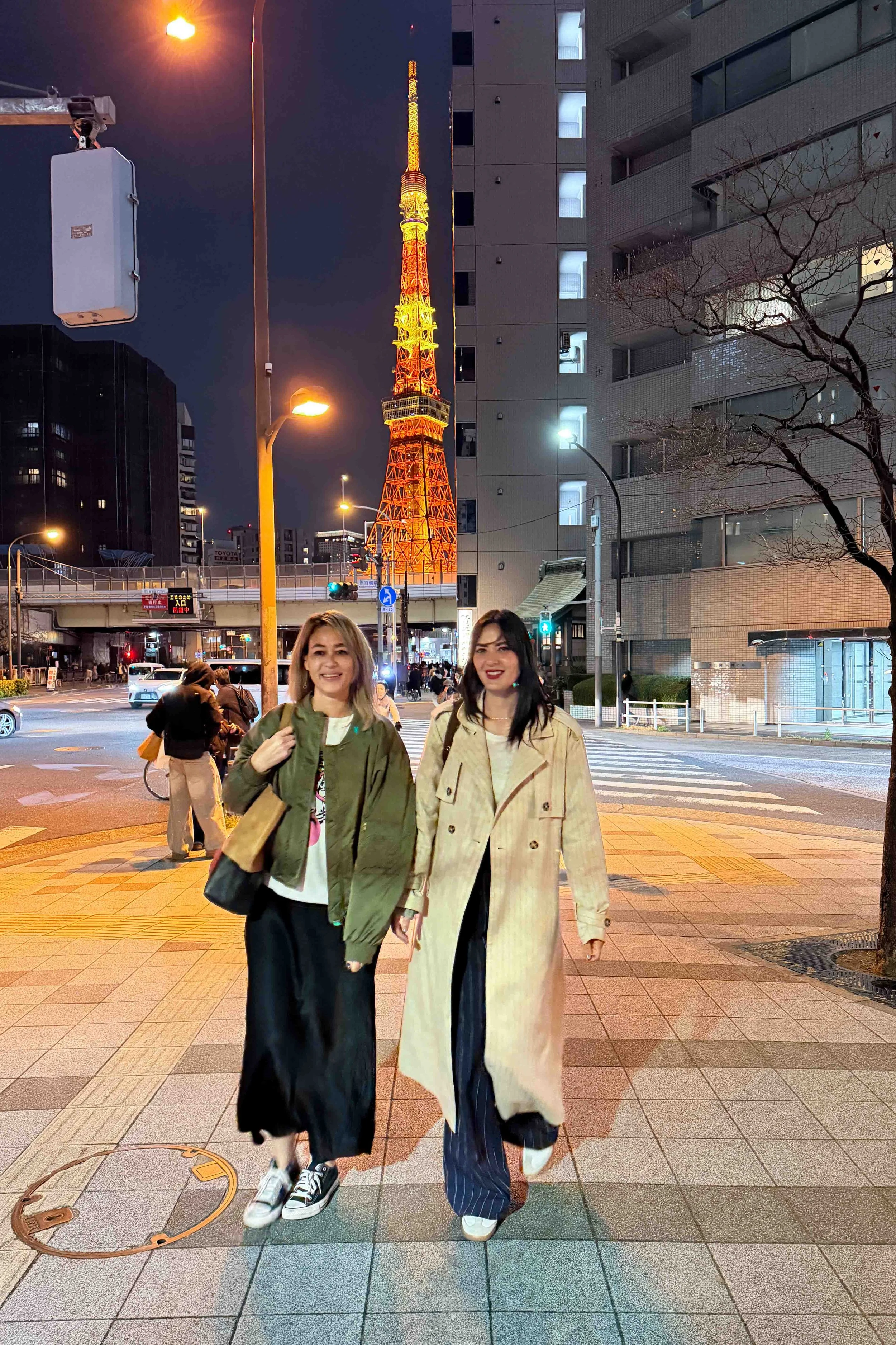 Walking the streets of Tokyo with the Tokyo Tower in the background