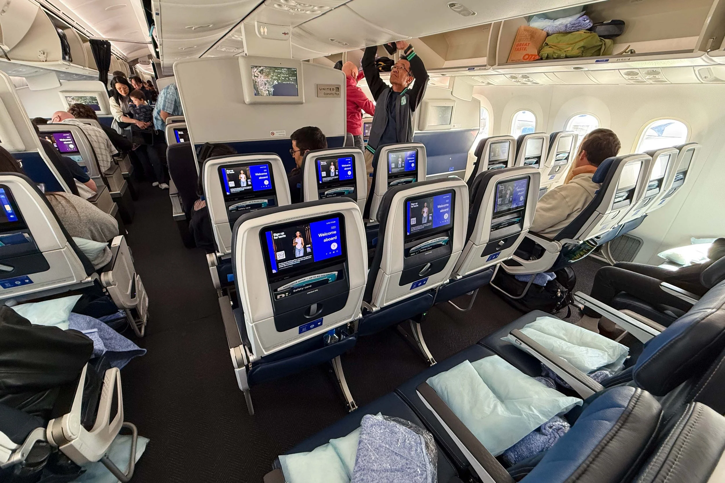 Aisle seat in the middle section United Economy Plus Seats extra legroom