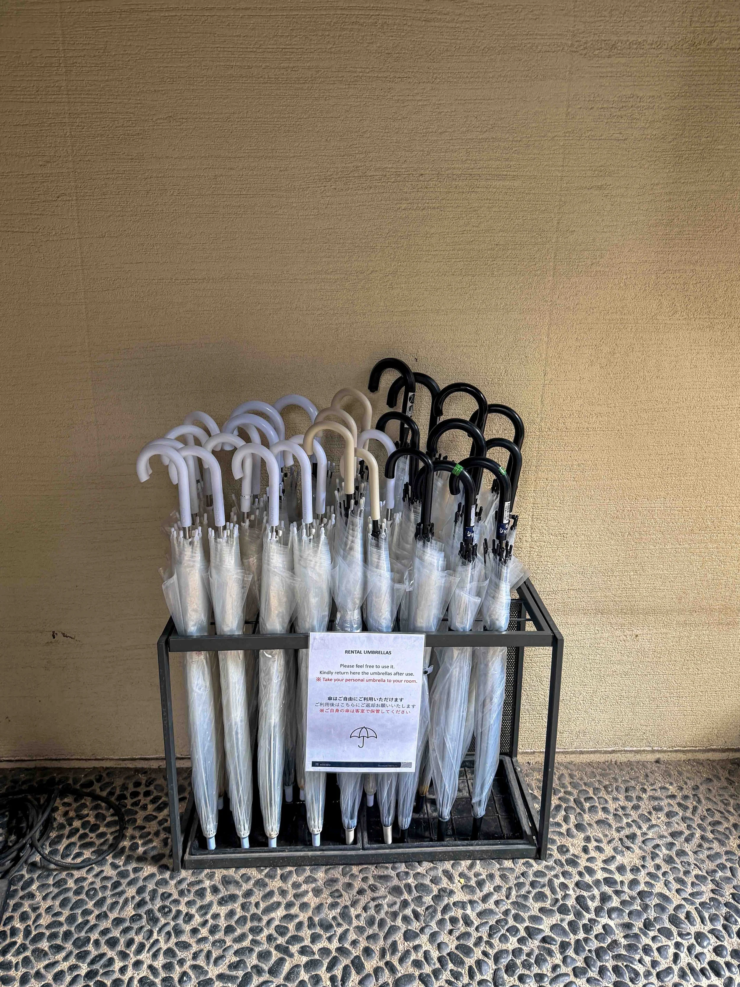 rain in tokyo japan umbrella rack