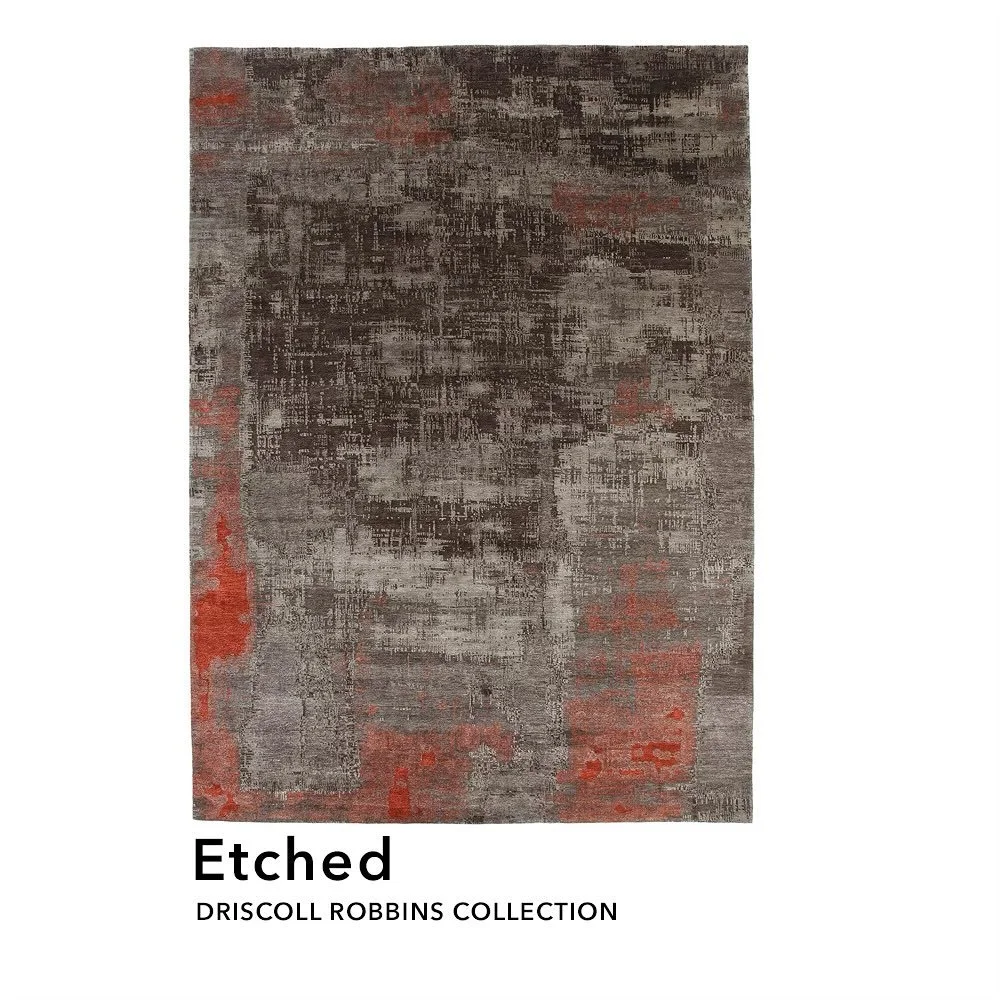 The feeling of etching brought onto a rug. This design is rustic with pops of red. Great piece to add an edgy touch to your room.