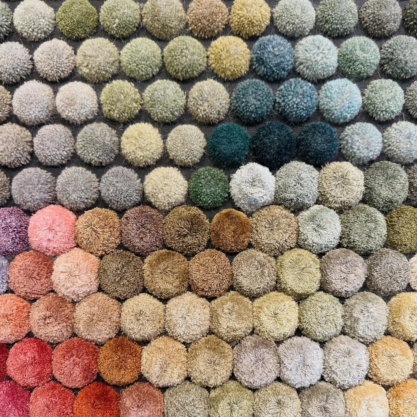 Elevate your space with our wool pom selections. Choose a hue and customize a Driscoll Robbins collection rug. We'll create samples showcasing color palette for your approval, then craft the perfect full-size rug for your space! We will work with you