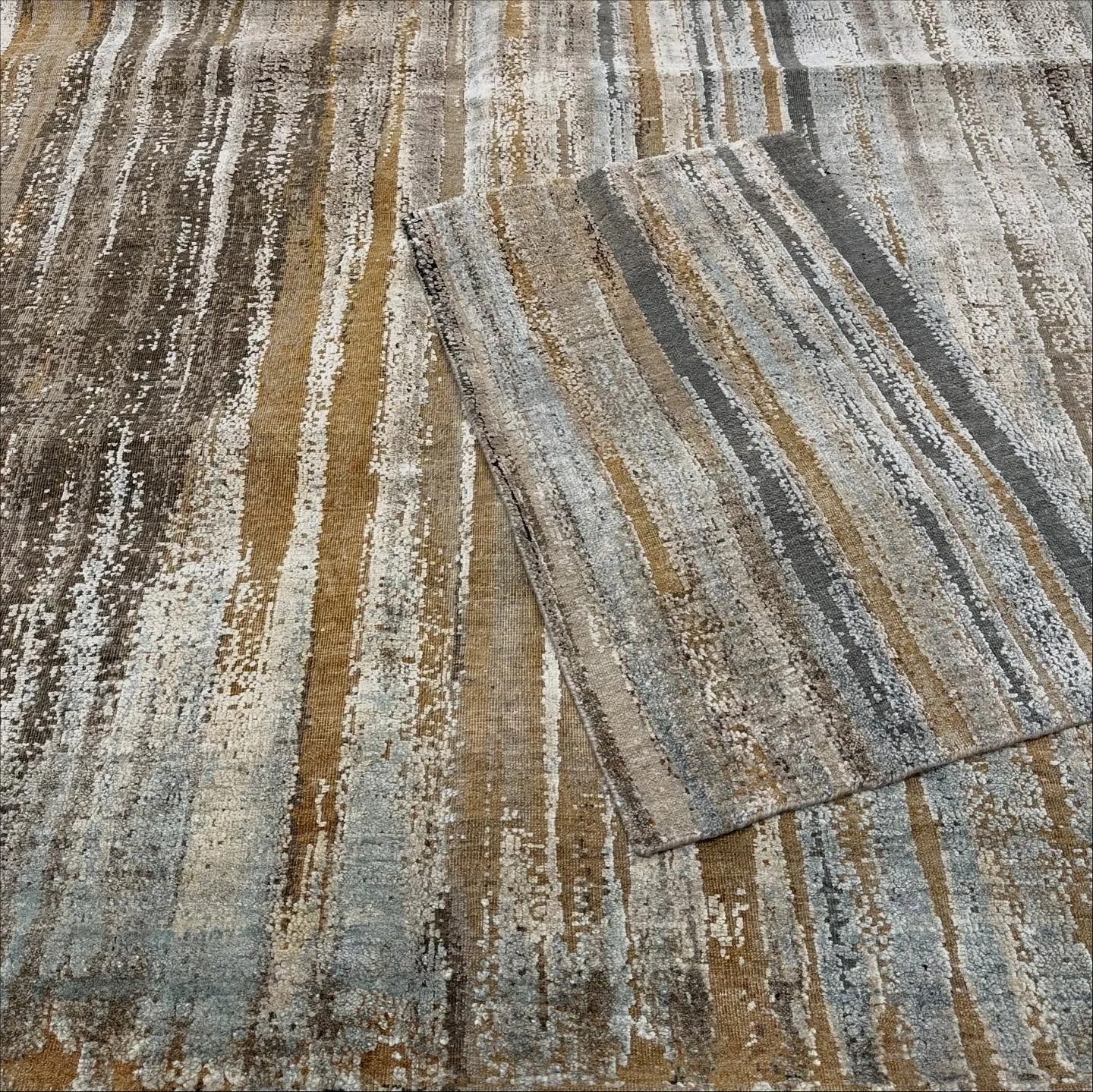 Fusions rug is a game-changer - literally a fusion of mute colors and urban style is pure nostalgic, with the distressed look adds a touch of edginess that sets it apart!