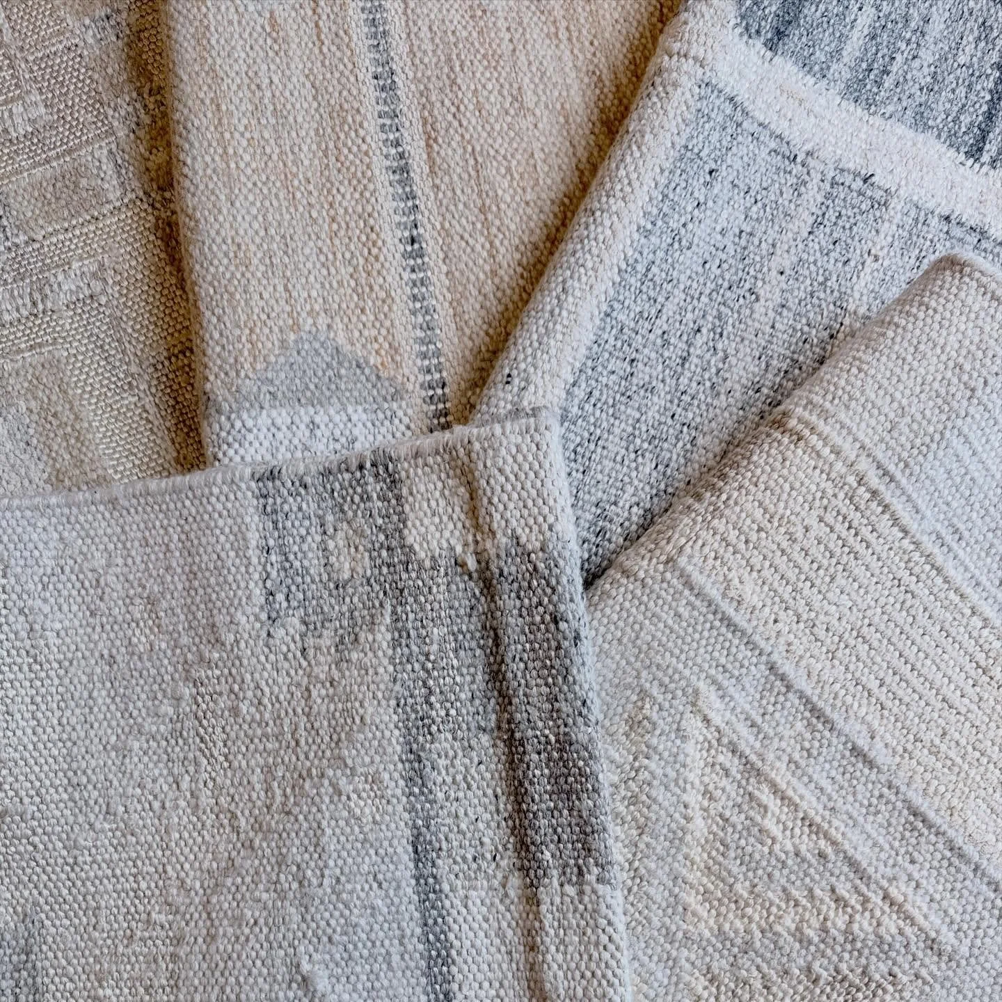 Explore the fusion of Scandinavian geometric patterns in Whites, Greys, and Beiges. Our vintage rugs blend traditional Swedish Minimalism with Rolland and Rya textiles, paired with modern deco styles to provide you with a variety of options in this s
