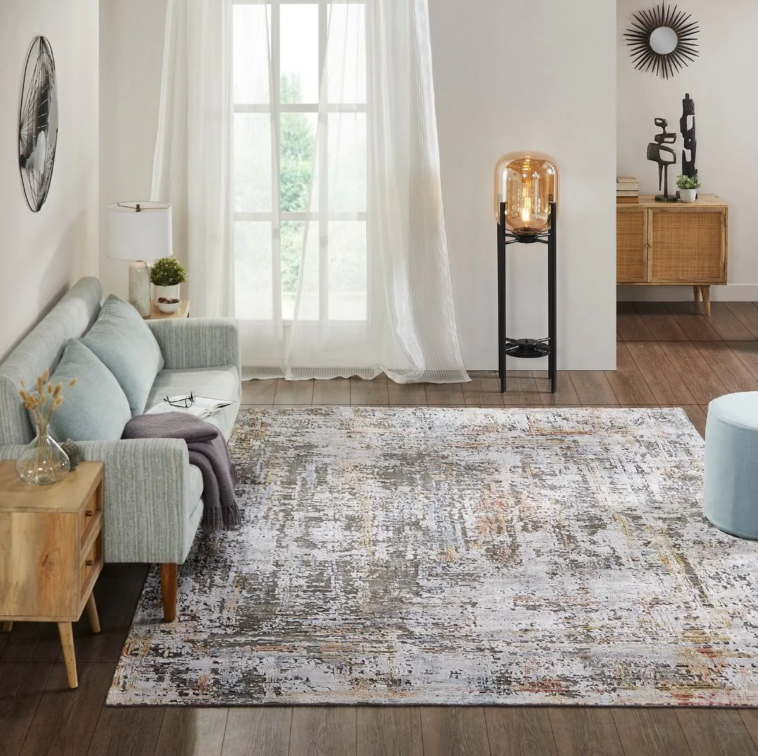 This handcrafted rug combines wool and silk to create a stunning piece of modern art for your home. Its vibrant color streaks add a unique element that captivates anyone who sees it. Sample is available in our Seattle showroom. @kalatyrug