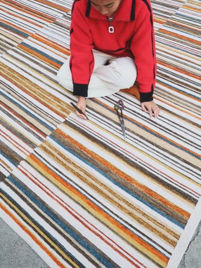 Step into a world of color with The Amala Collection with the Bib Patterns! Our showroom features samples of various colorways to inspire your space's personality. You have to see our full-size rug up close to truly appreciate this beautiful piece!