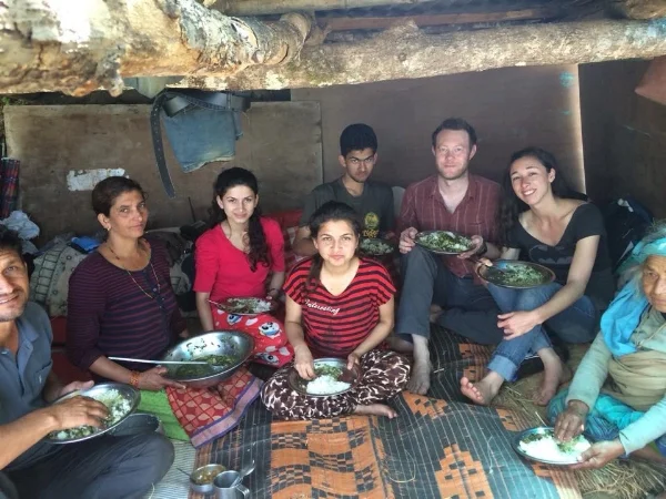 About a week after the earthquake, there were 8 of us living out of this little shelter! Pictured here with the Neupane family and Nat, my partner and ParticipAid co-founder. 