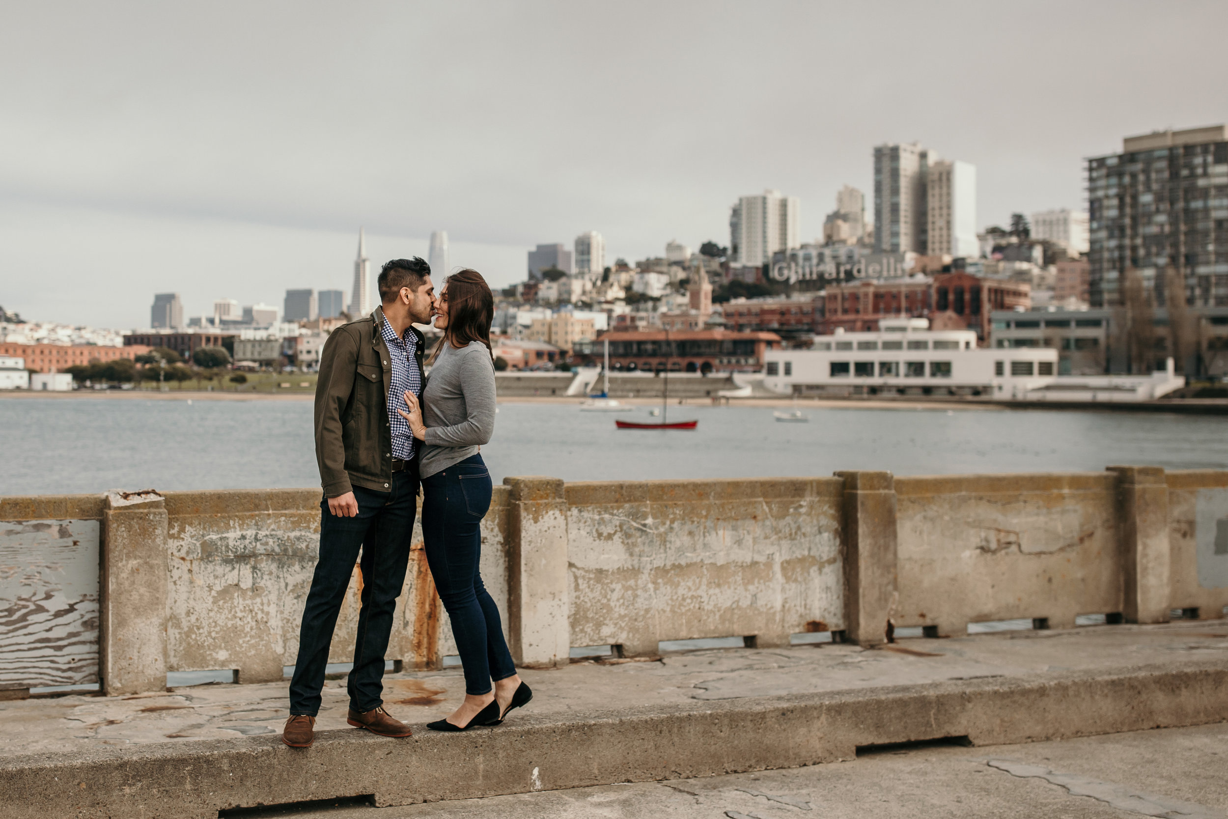 bre thurston photography | san francisco bay area wedding engagement photographer | engaged couple photo session in city, foggy forest, stormy beach, red dress