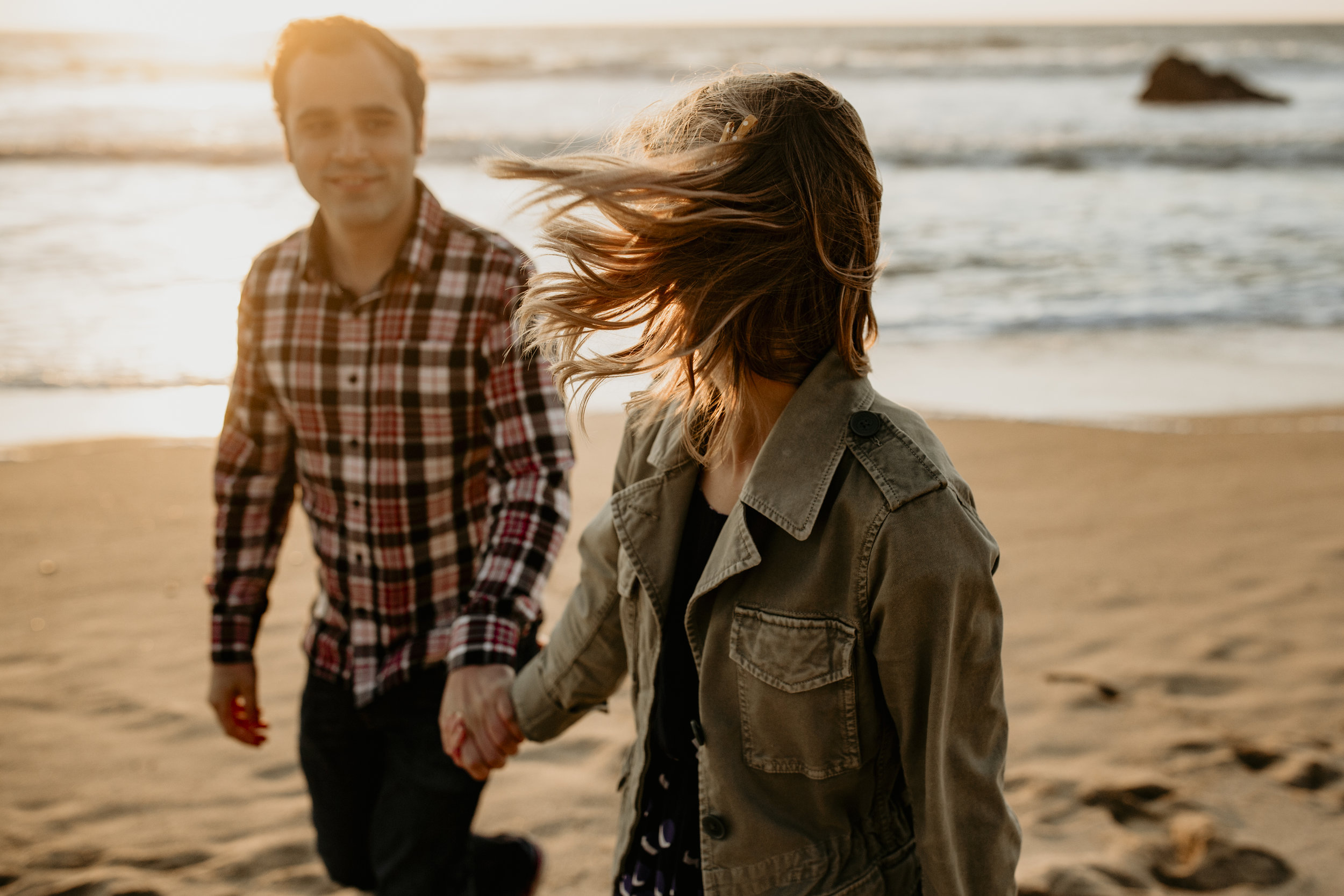 best san francisco wedding photographer bay area engagement photography bre thurston | couples on the beach at golden hour sunset
