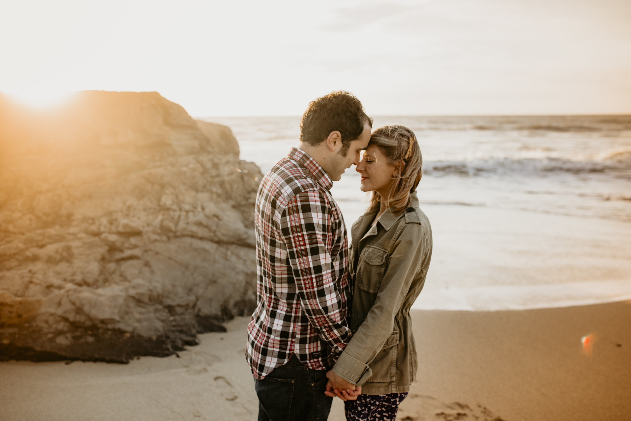 best san francisco wedding photographer bay area engagement photography bre thurston | couples on the beach at golden hour sunset