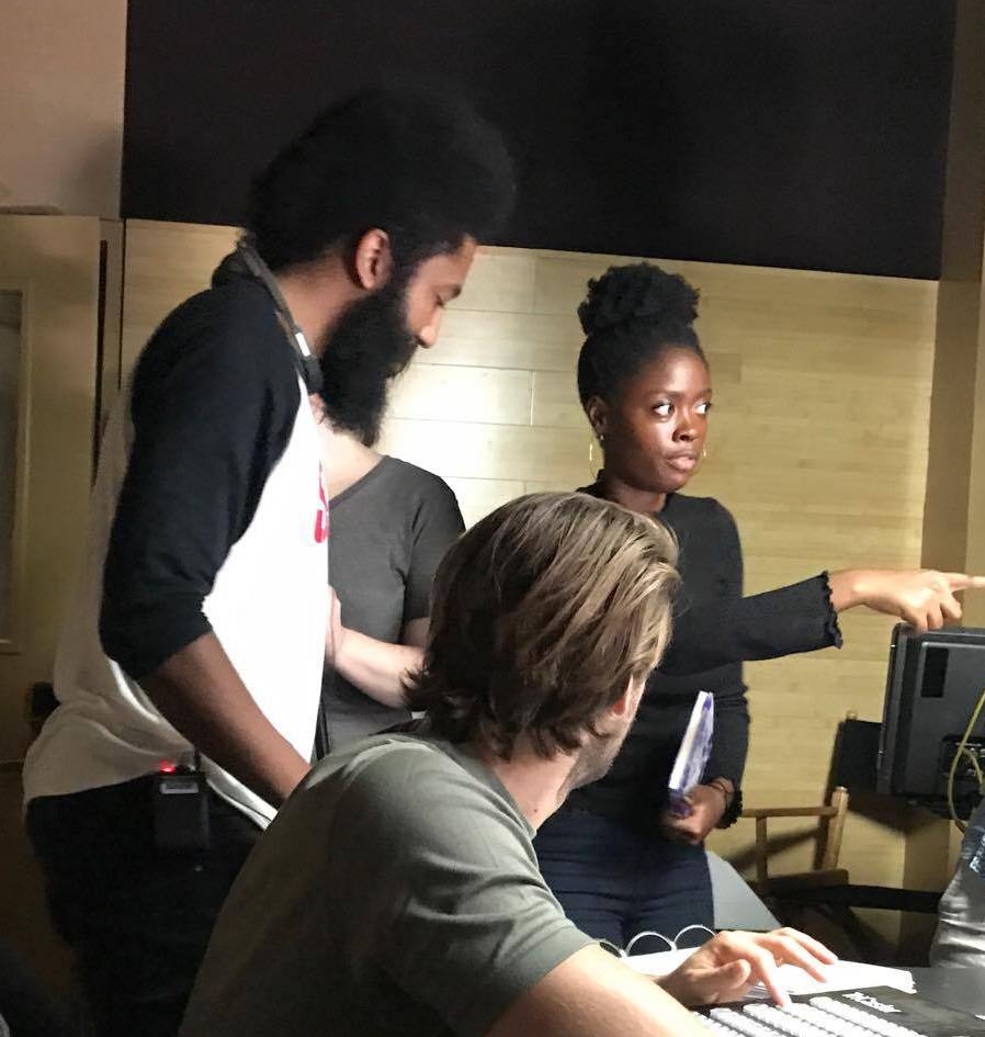 Director Terence Johnson works with fellow DKA alum Nyasha Bryant on set as Bryant, In the role of 1st AC, oversees the shoots scheduling.