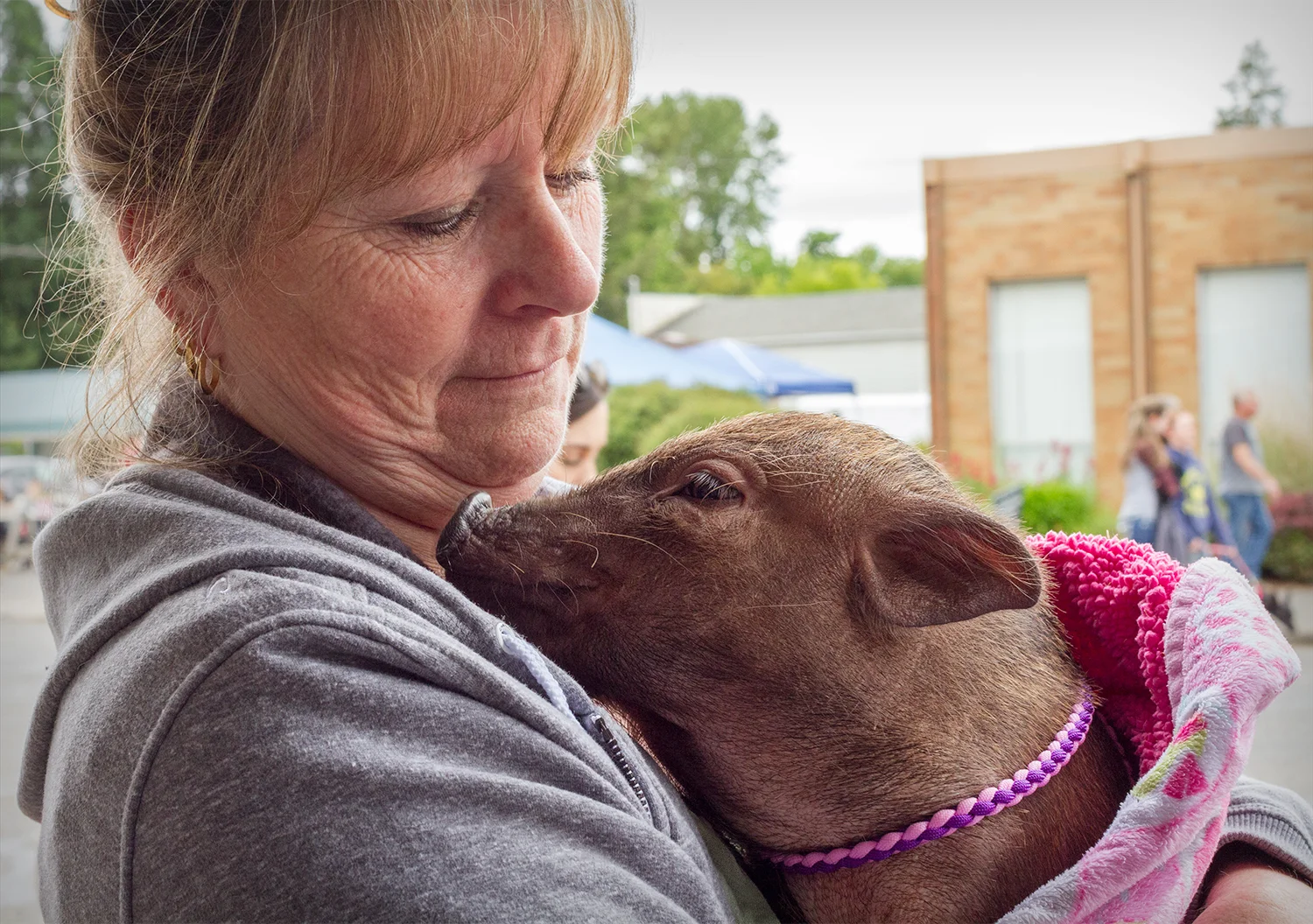 Woman with Piglet