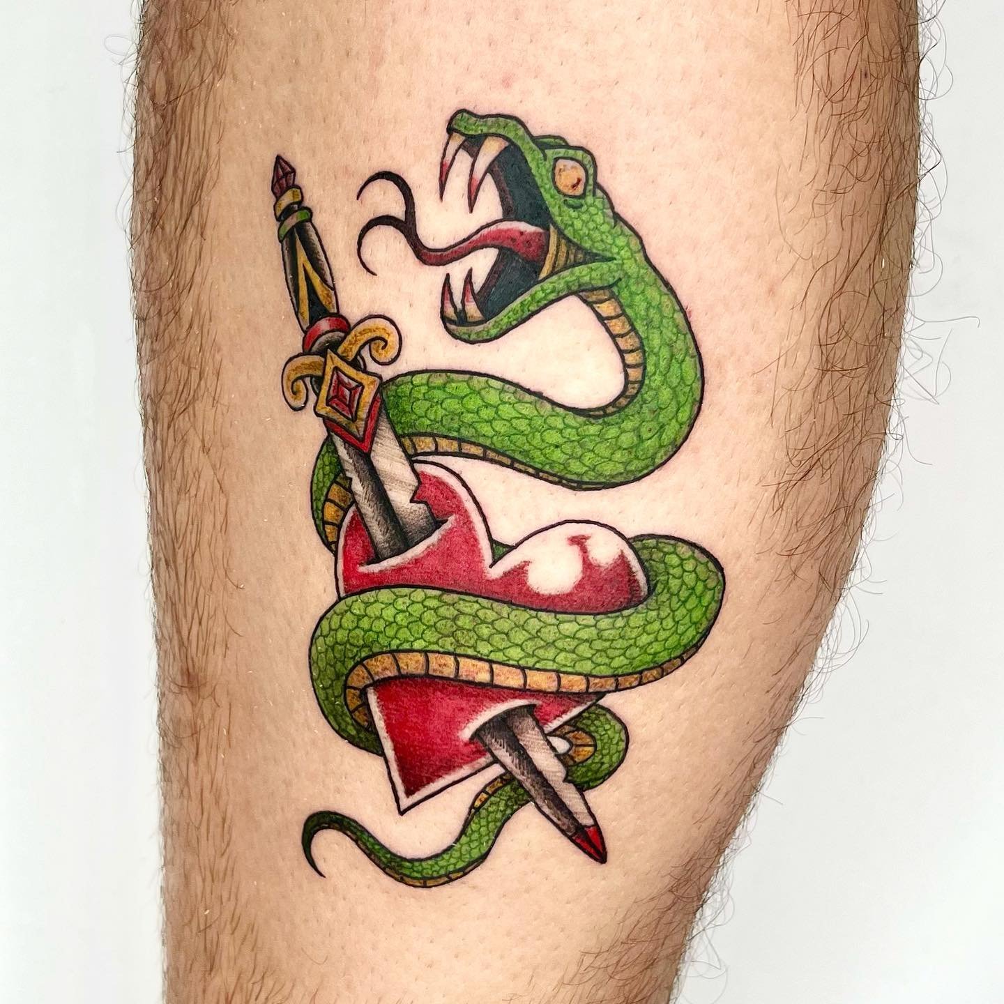 SERPENT DAGGER THRU THE HEART FULL COLOR!!!
In my color eta, this thing is like a sticker I&rsquo;m so hyped w it, swipe for close ups weird angles and a healed of the skull spike warrior &gt;:)

Dm to book an appointment 
&hellip;
#tattoo #tattoonyc