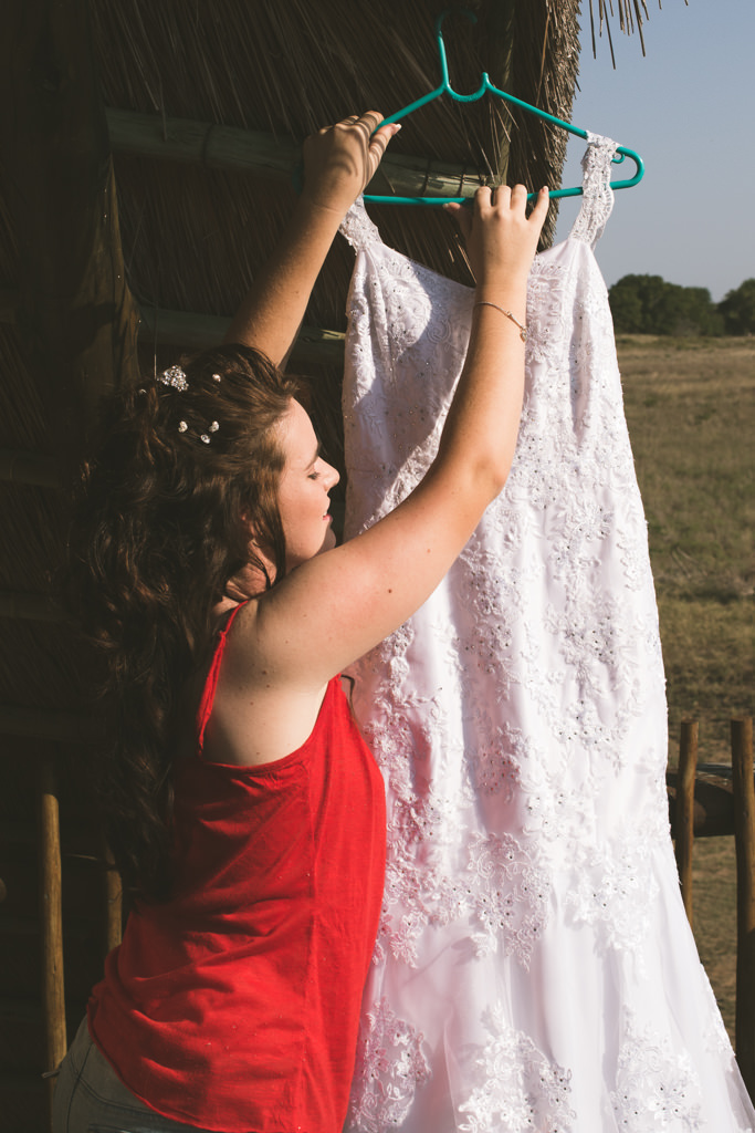 Safari Park Hluhluwe St Lucia RBadal Photography bride reaching for dress