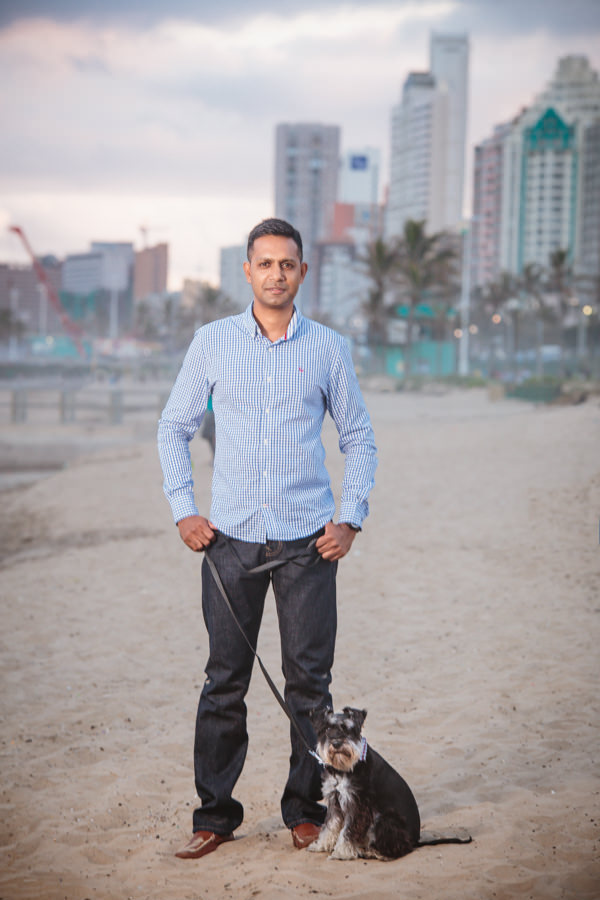 ceo portrait shoot durban rbadal photography at beach with dog on leash north beach