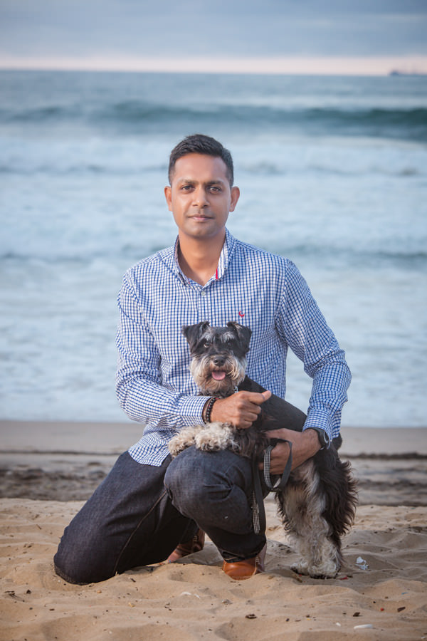 ceo portrait shoot durban rbadal photography at beach with dog north beach