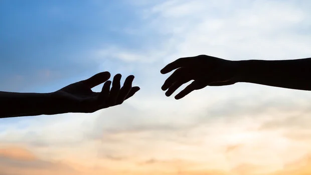 connecting hands grief and loss.jpeg