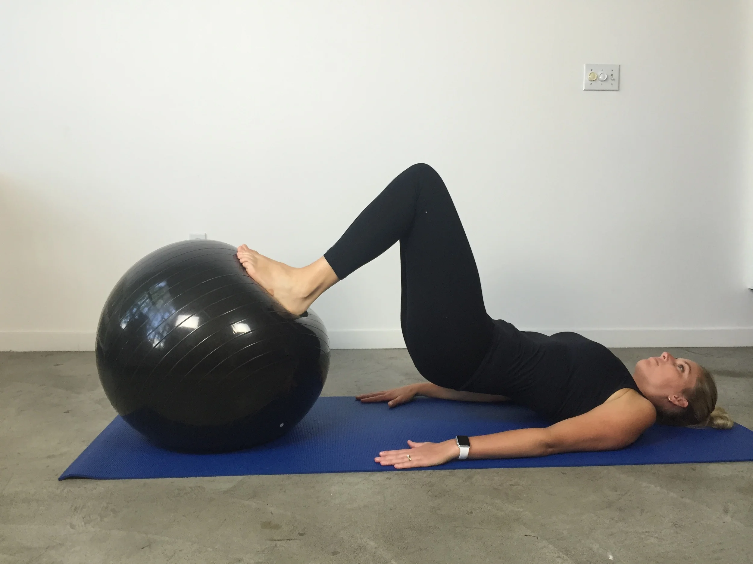 Swiss ball bridge & curl - end position