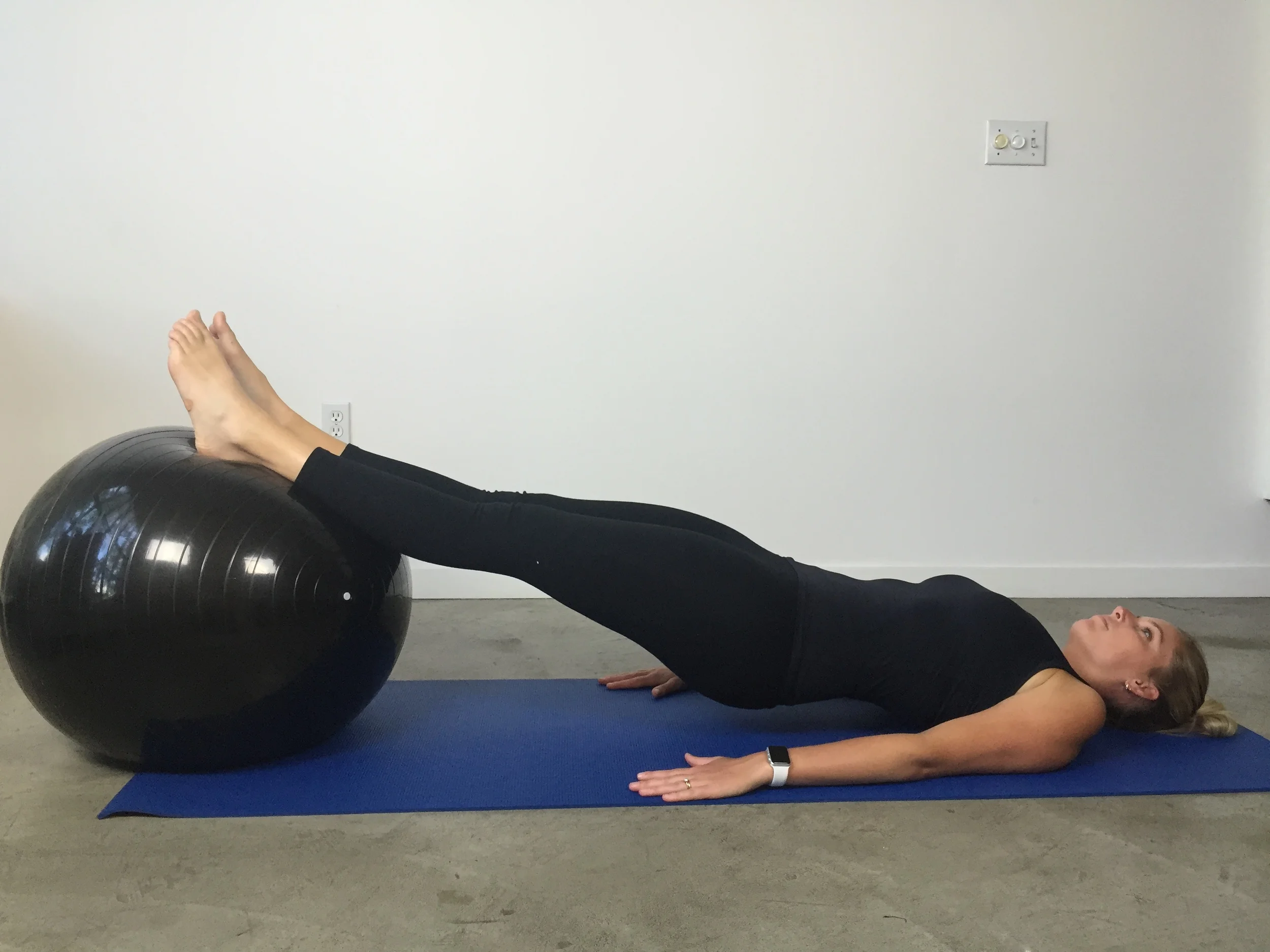 Swiss ball bridge & curl - start position