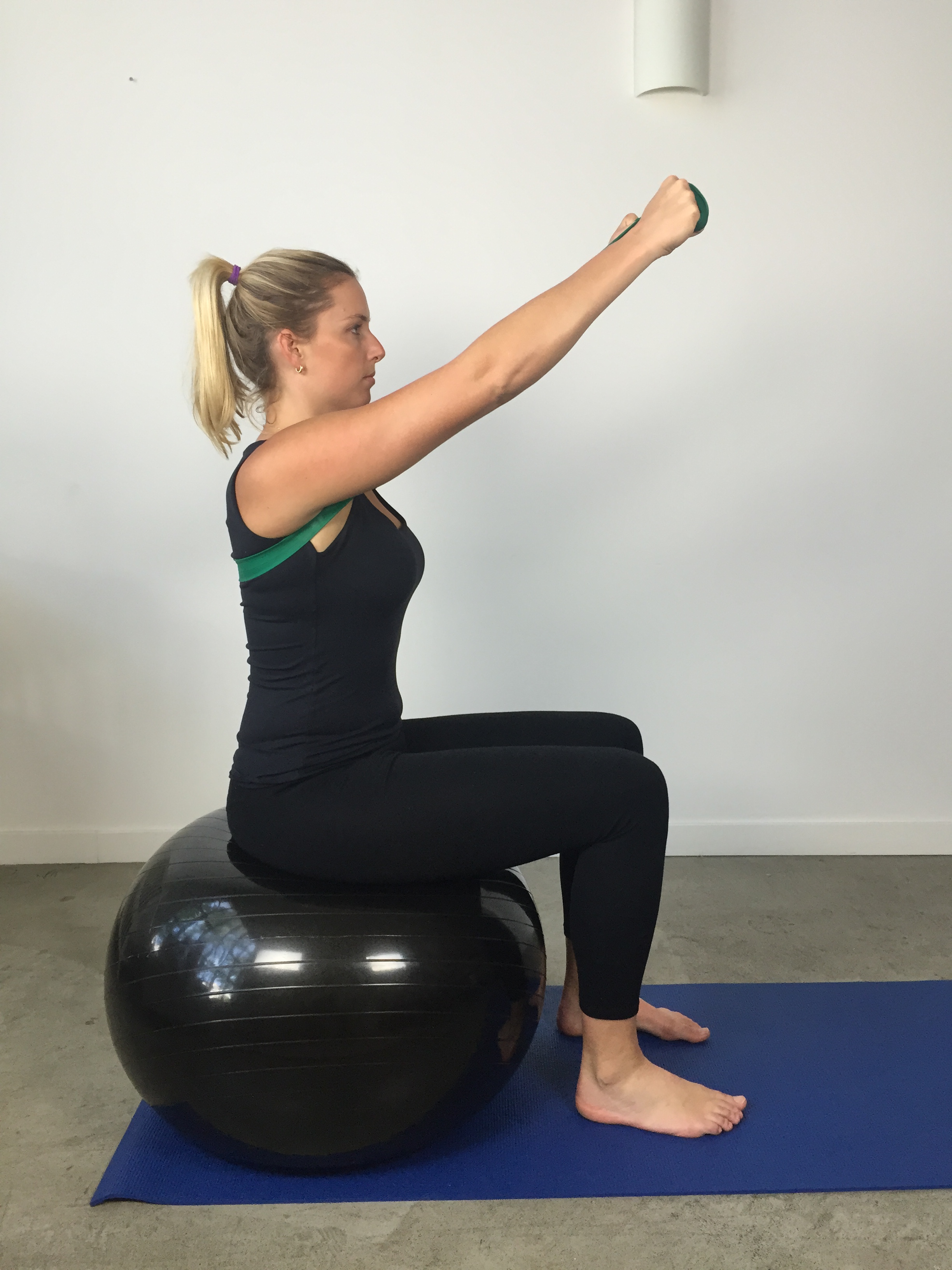 Seated theraband forward press - end position
