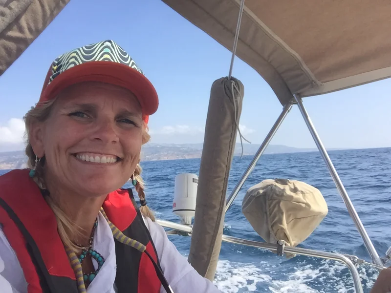 happy me about an hour out (and yes, the bimini and barbecue are coming off soon :-))