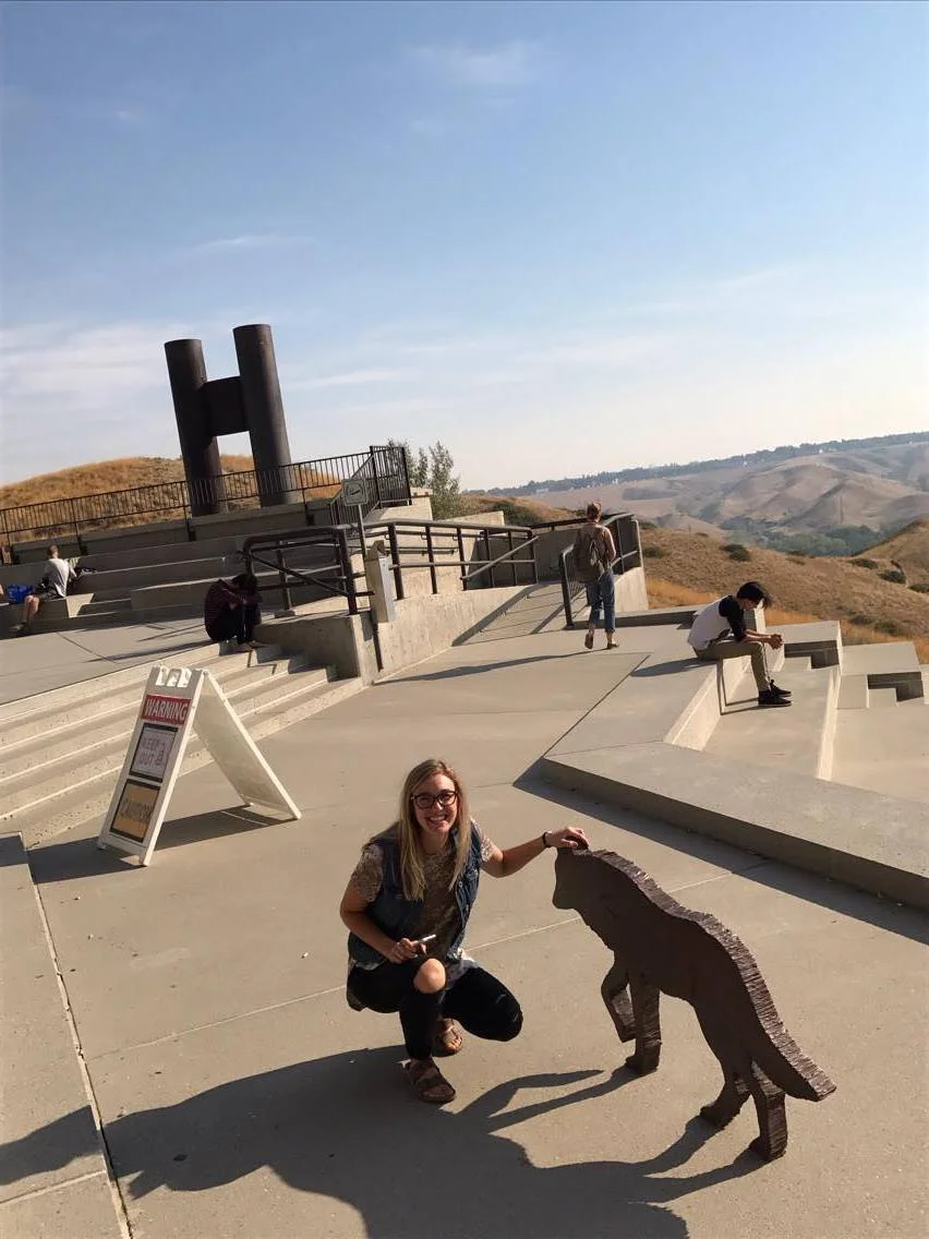 Reanne saying hello to the wolves on the UHall patio near the smoke stacks. 