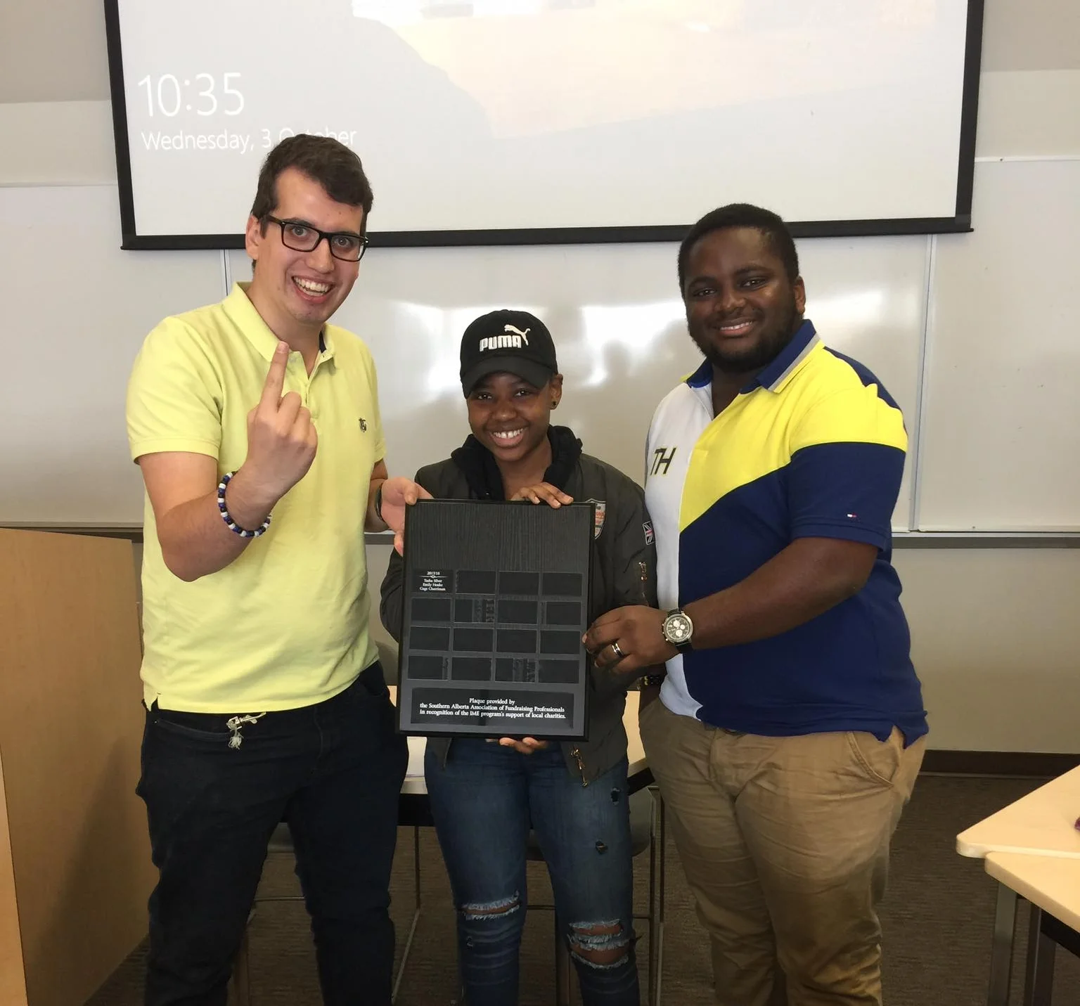Winners of the 2018 IME internal case competition, Peter Hurd-Watler (left), Tabby Ndhlovu (middle), and Bill Nkeih (right).