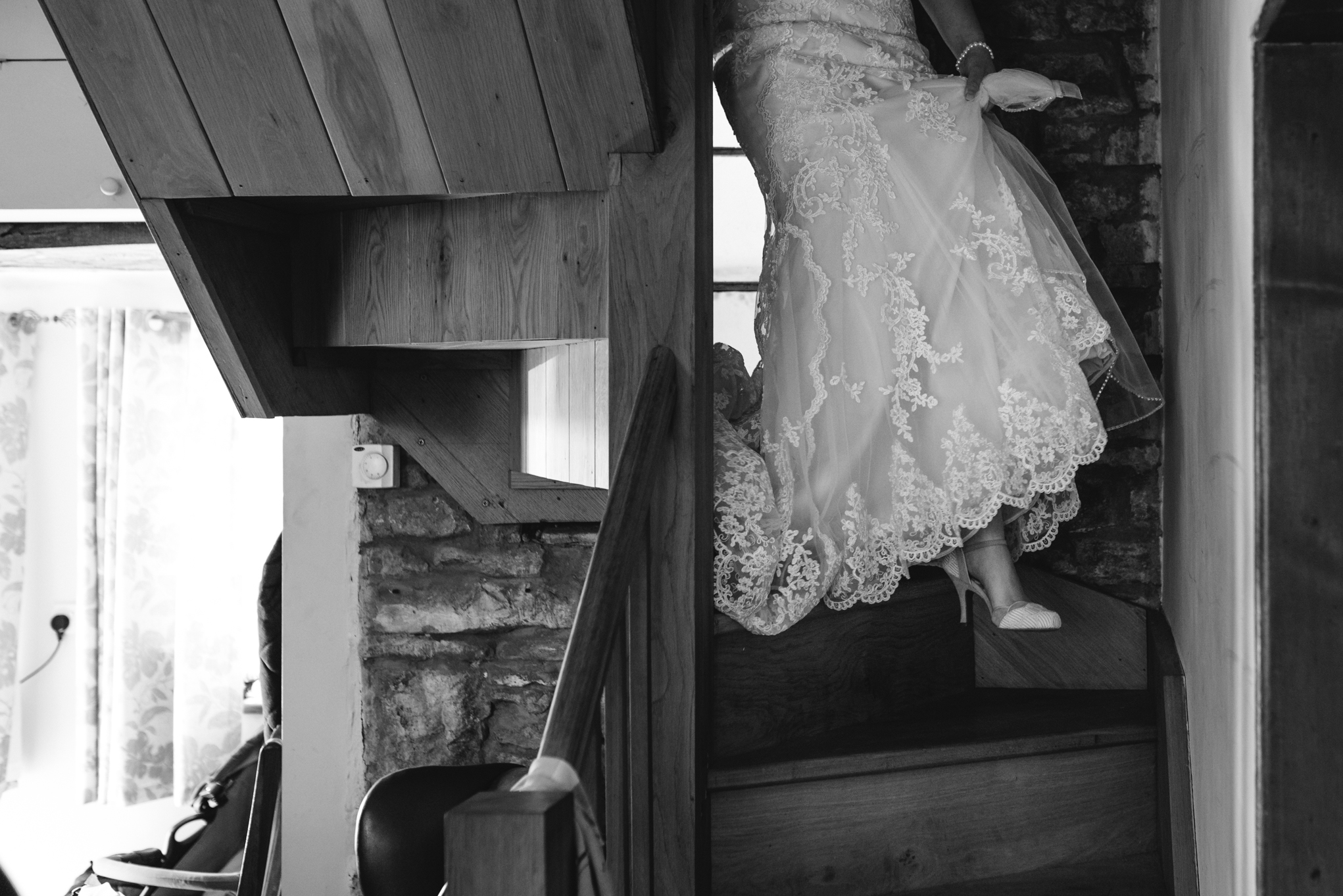 Bride walking down stairs