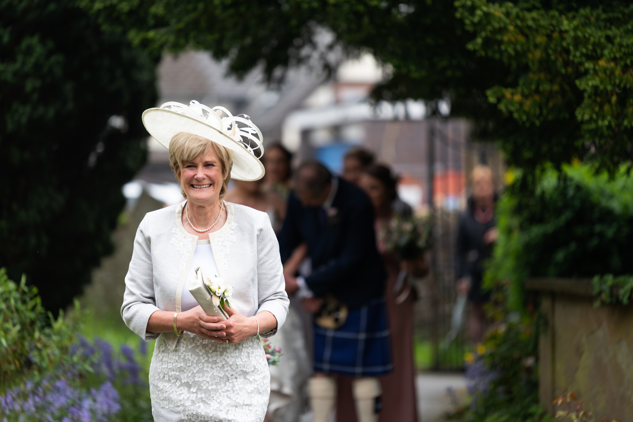 Brides mum arriving at church - Powys Wedding Photography