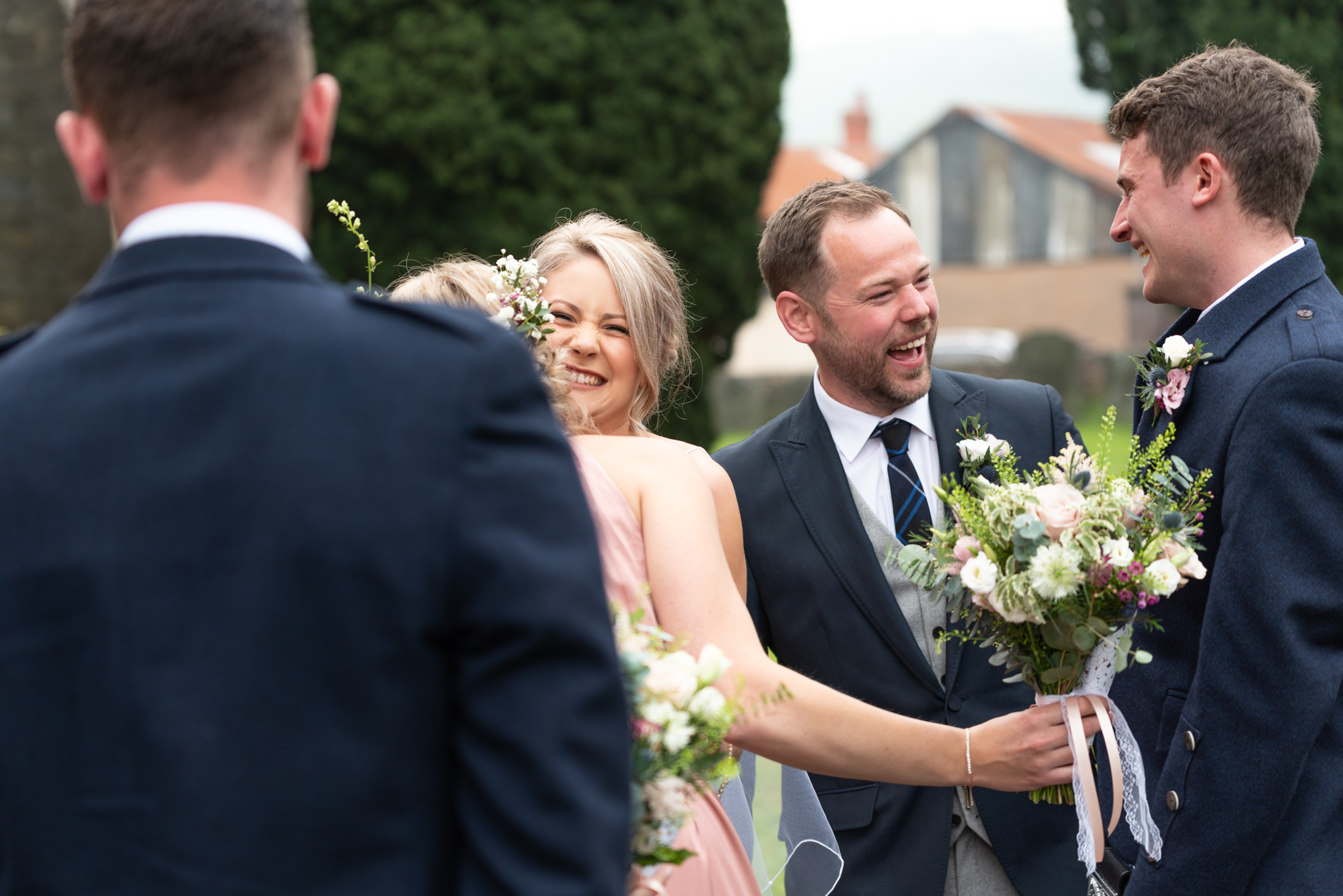 Newly weds greeting guests - Powys Wedding Photography