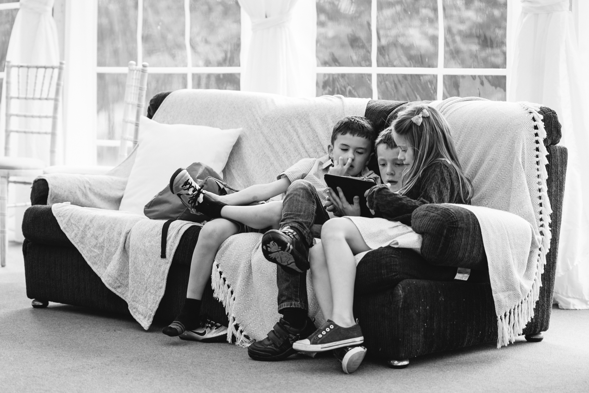 Child picking nose at reception - Powys Wedding Photography