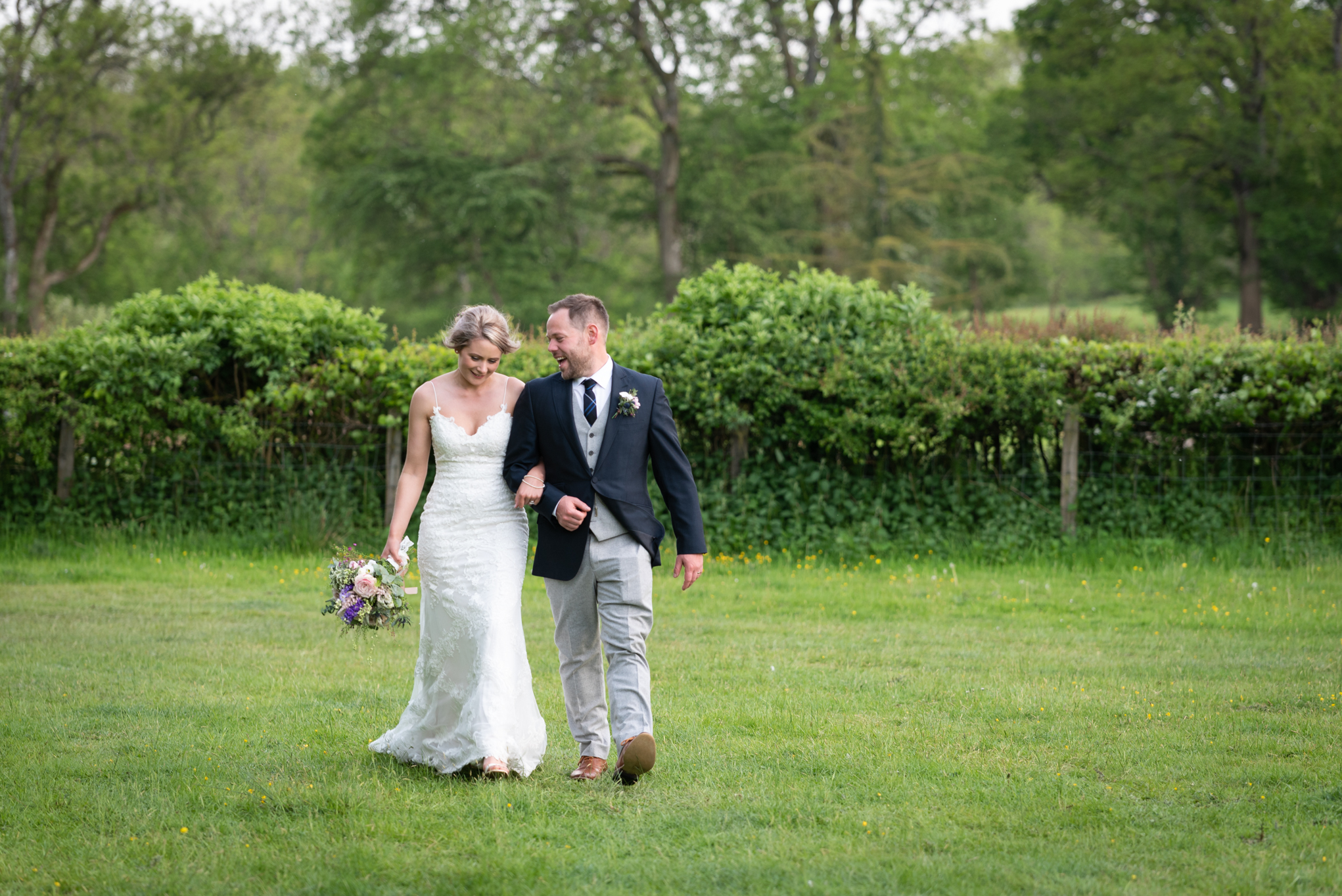 Bride and groom walking - Powys Wedding Photography