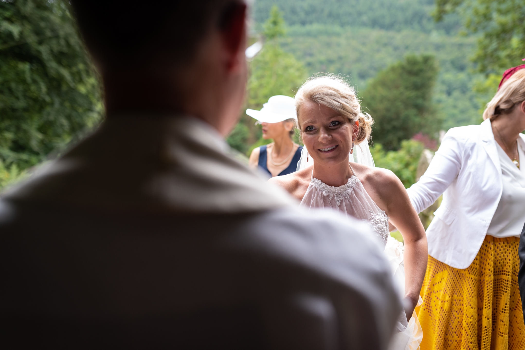 Copy of Bride arriving at Church talking to Vicar