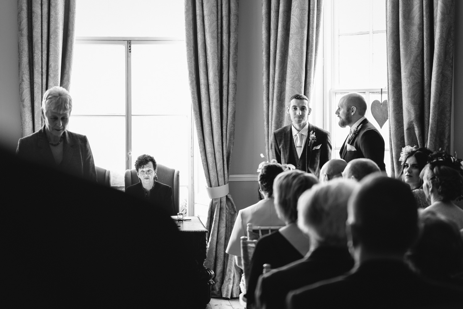Groom waiting at ceremony