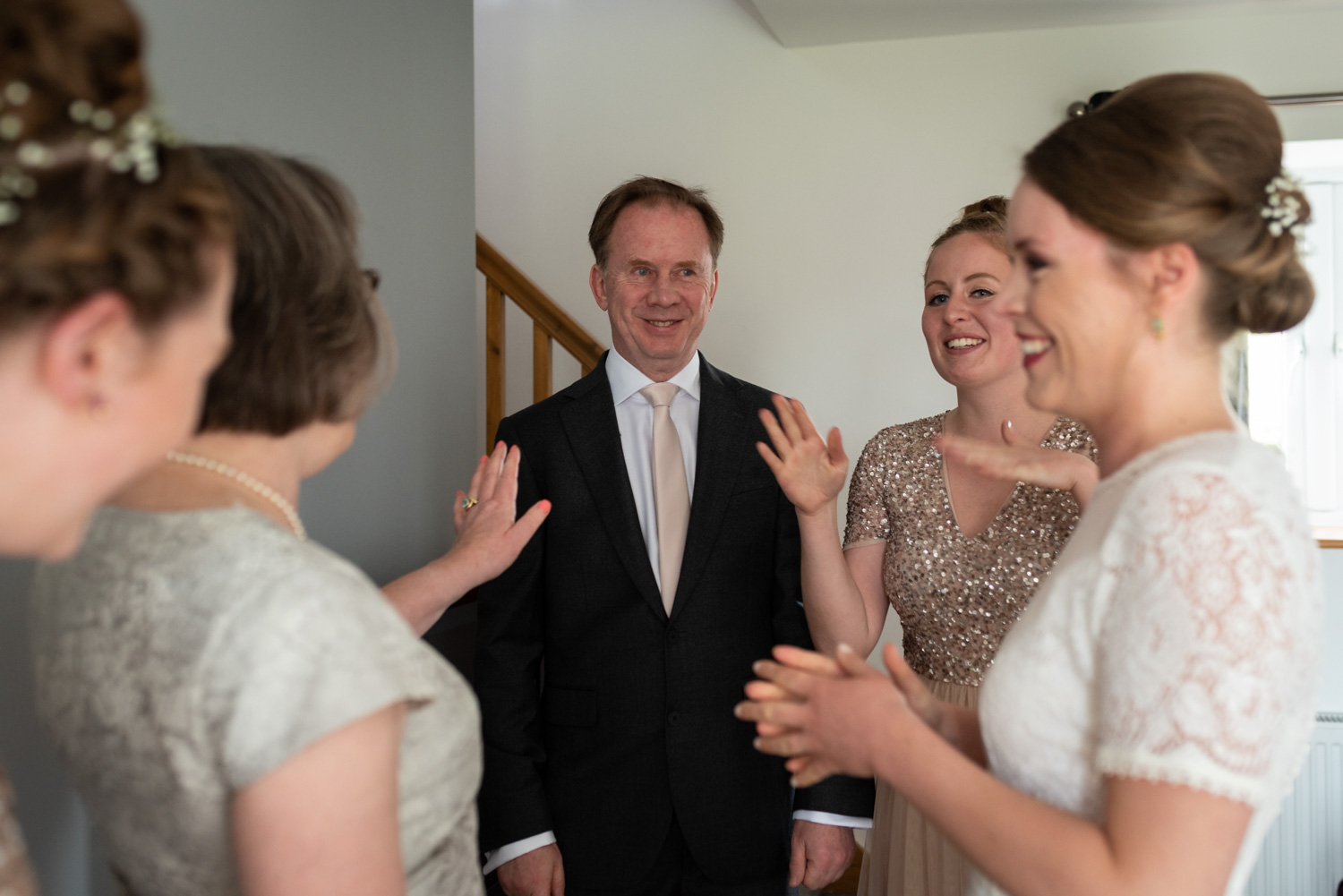 Father of bride looking happy when sees bride