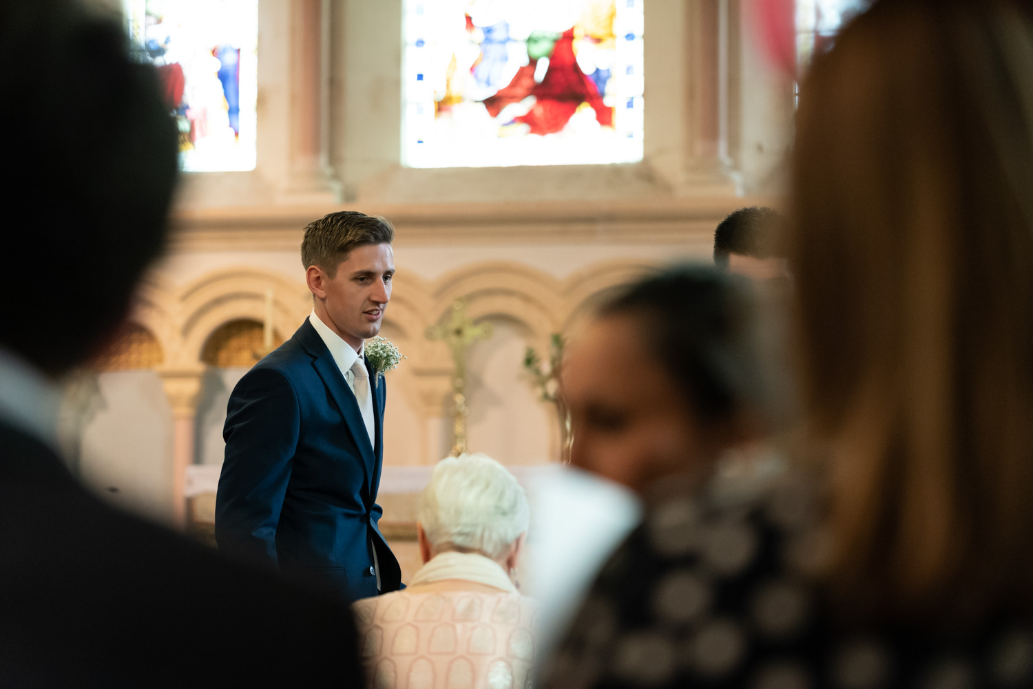 Groom waiting at church