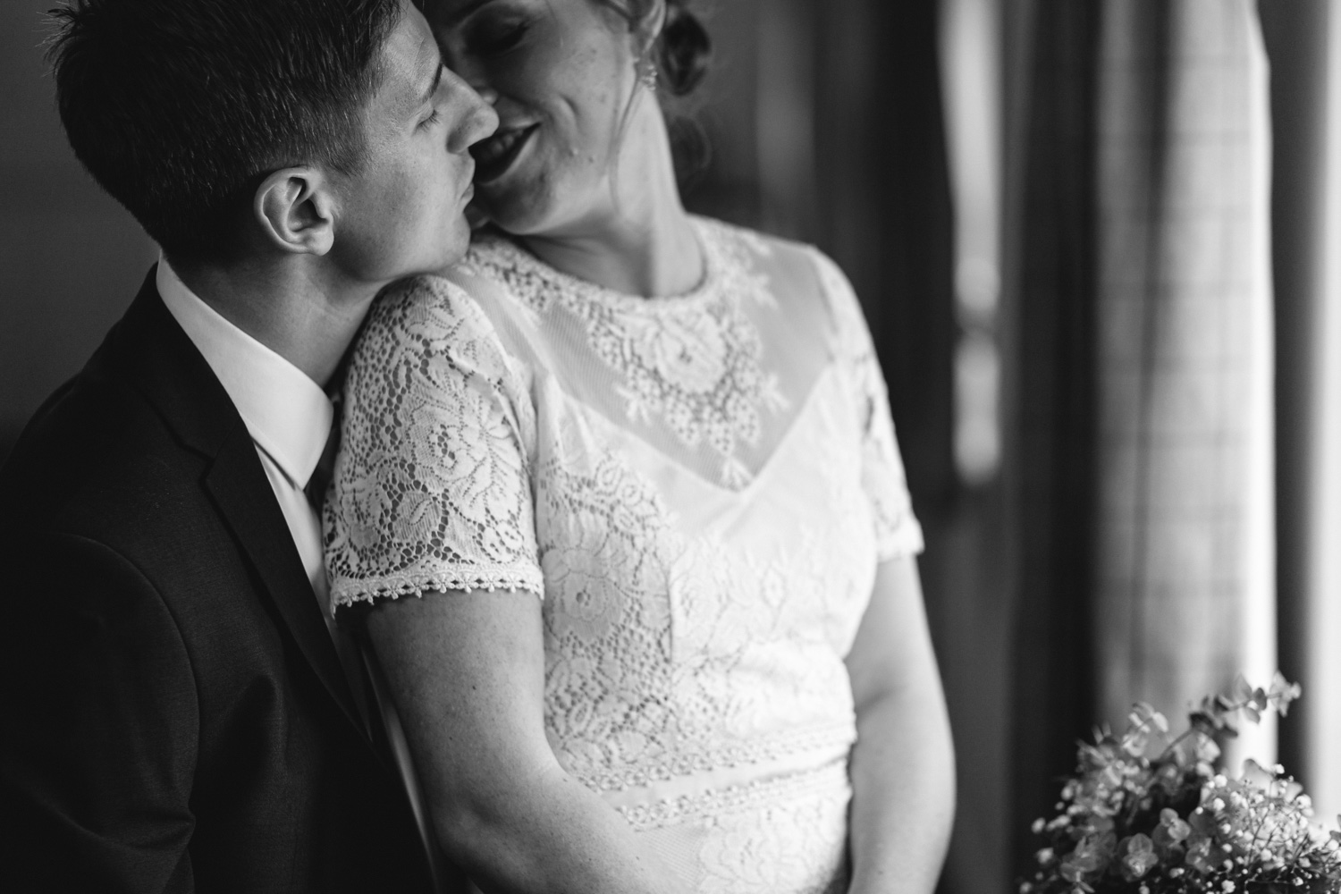 Bride and groom photograph kissing