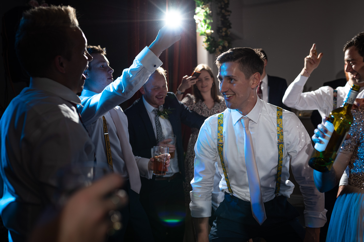 Groom dancing at wedding