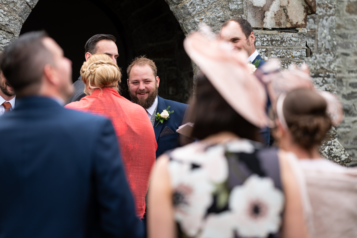 Groom stood at church laughing