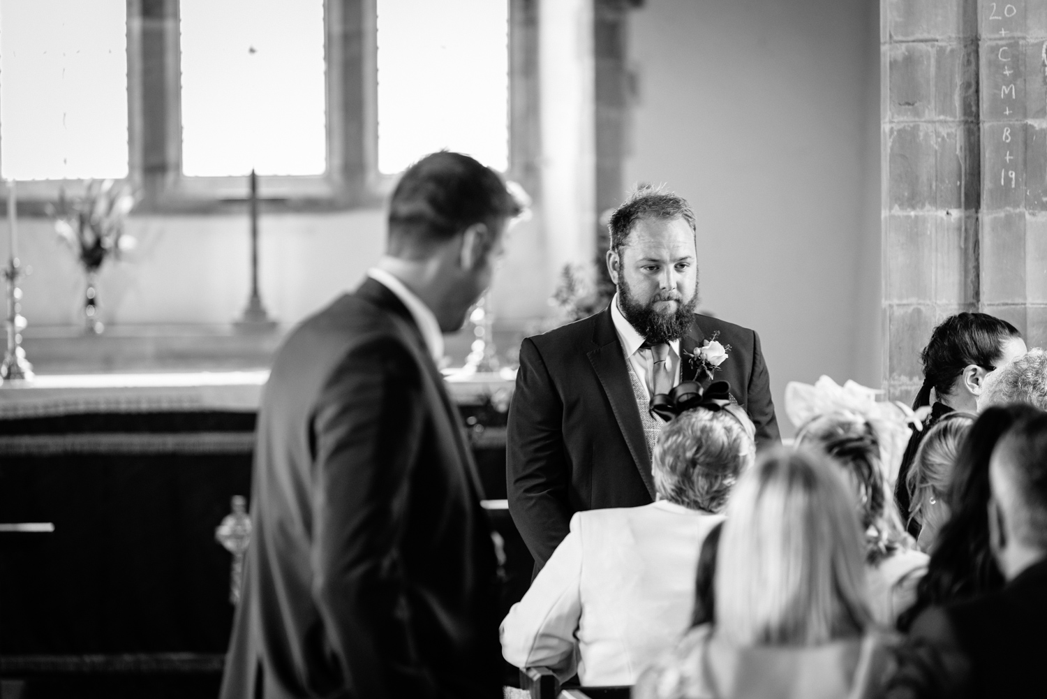 Groom stood at front of church